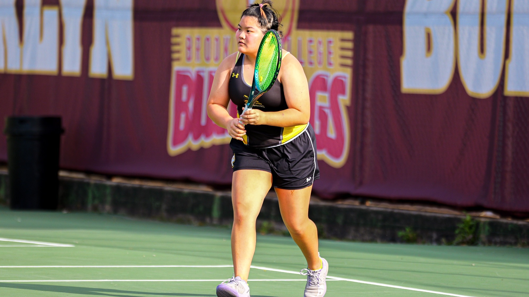 Elva Yu awaits a ball on the baseline