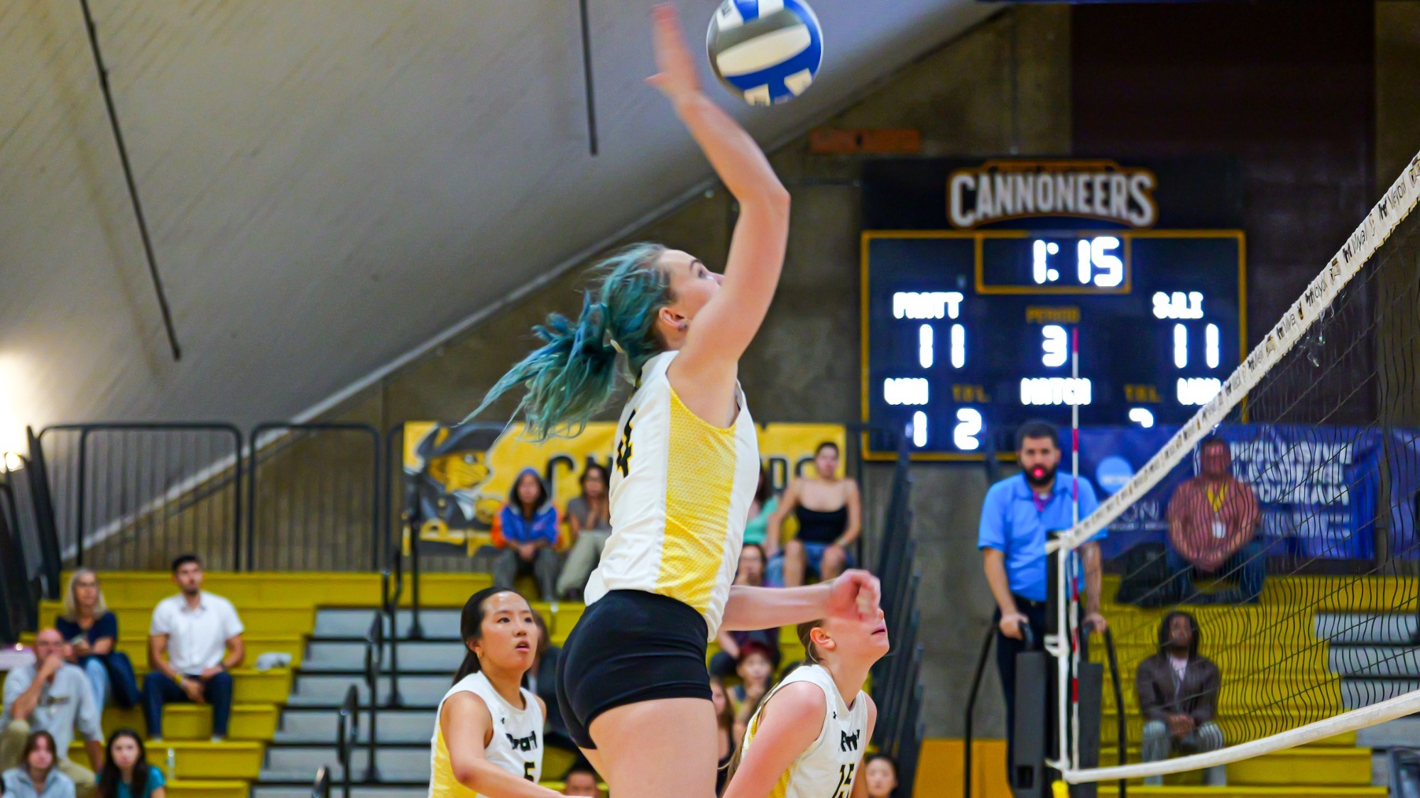 Jamie Shoemake goes for a spike on the right side in the third set of Pratt Women's Volleyball match with St. Joseph's