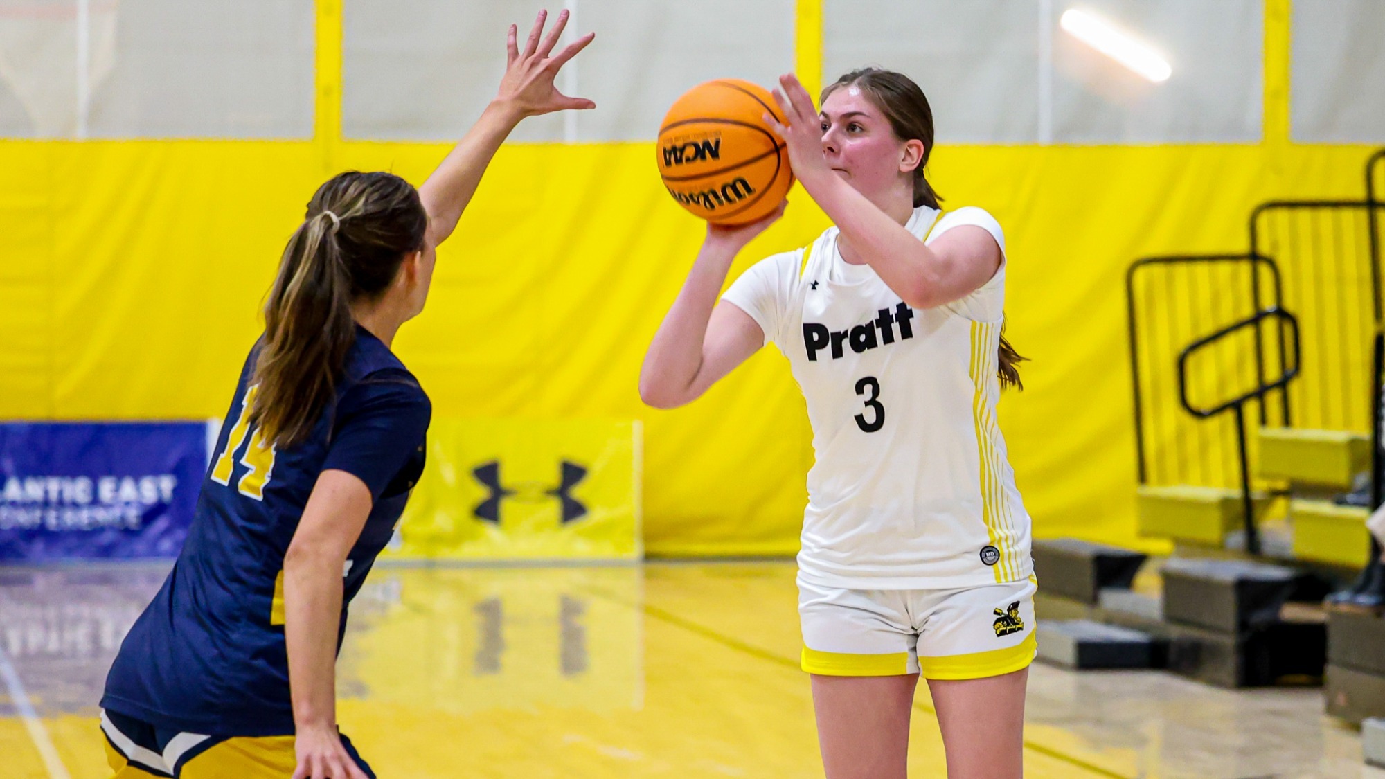 Lola Mactavish shoots a three--pointer