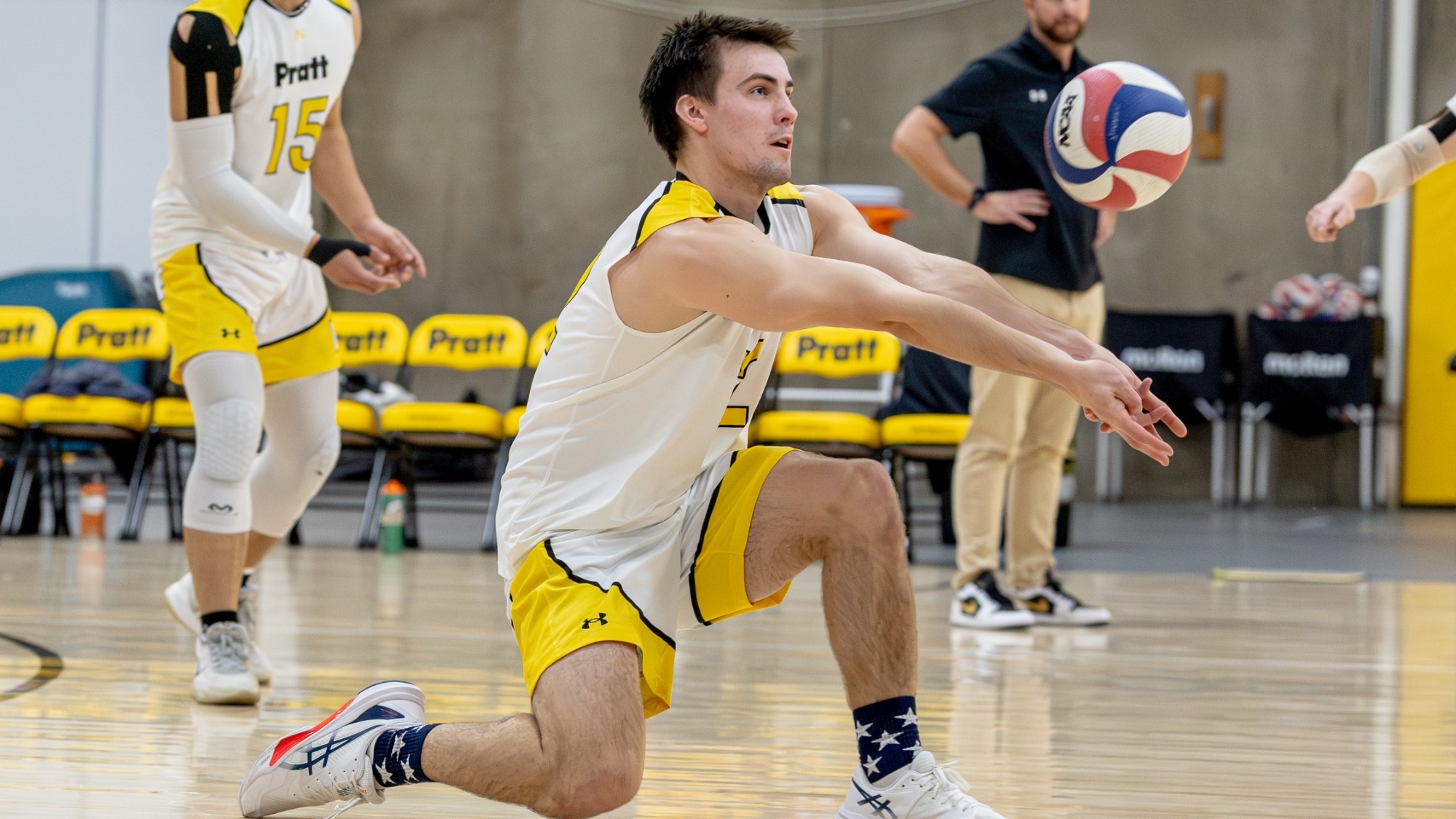 Griffin Benkhovsky digs a ball