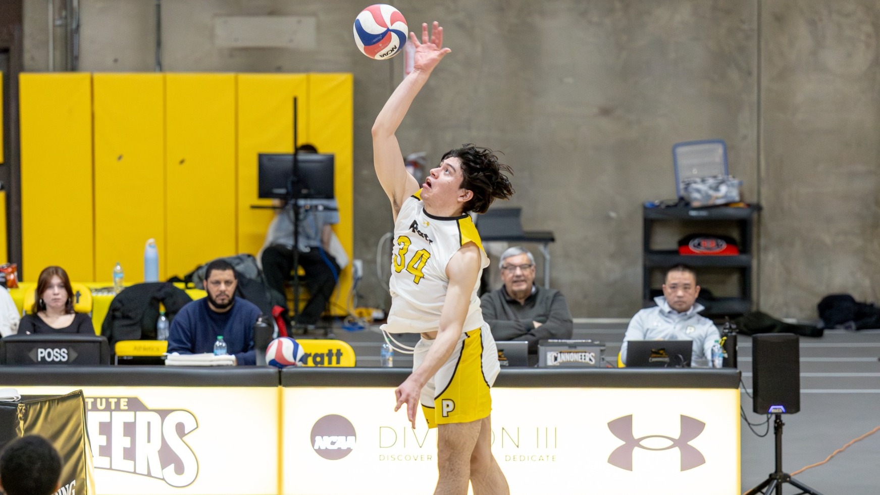 Arturo Mata spikes the ball 