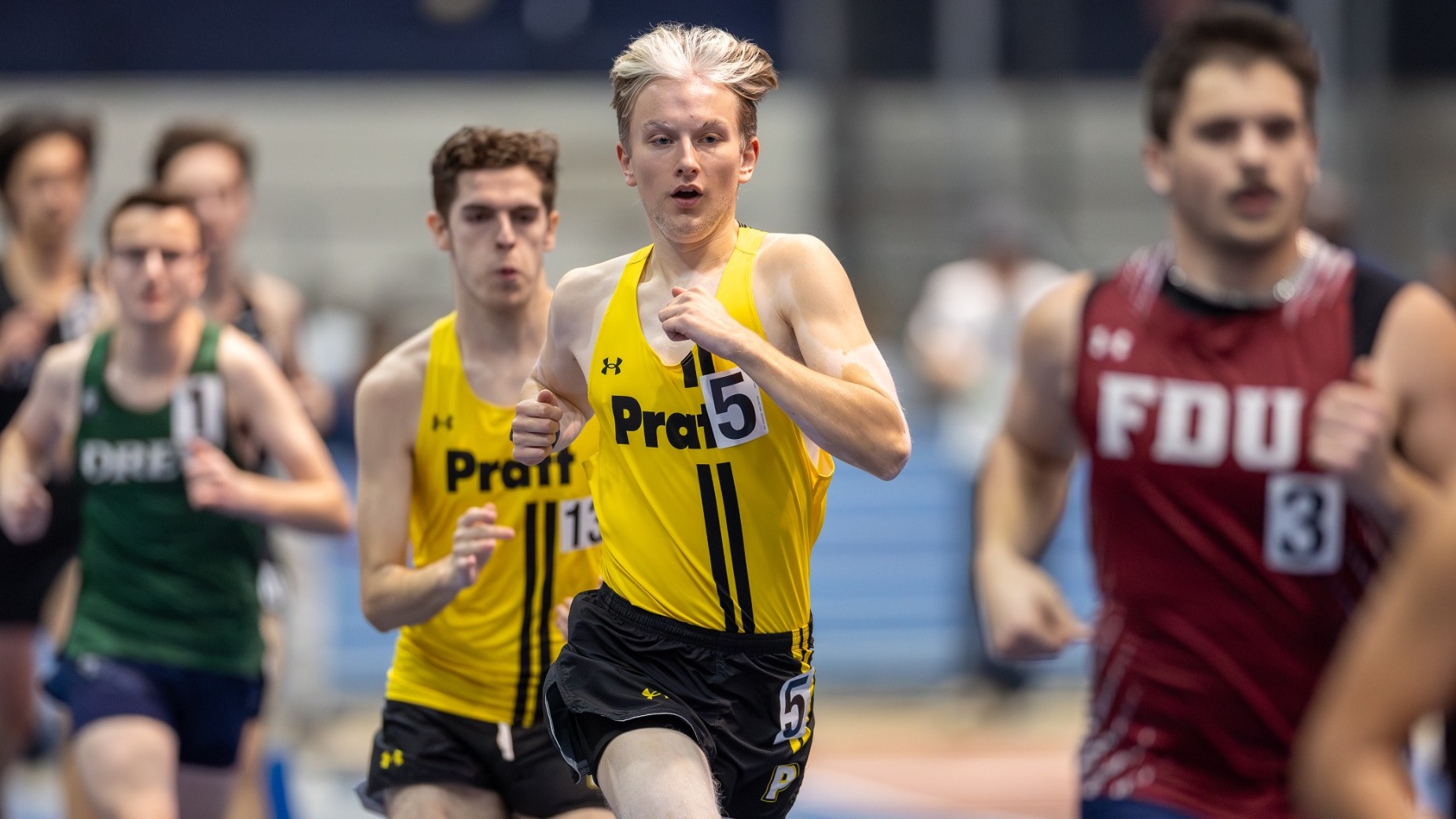 Liam Reilly runs in a pack of runners.