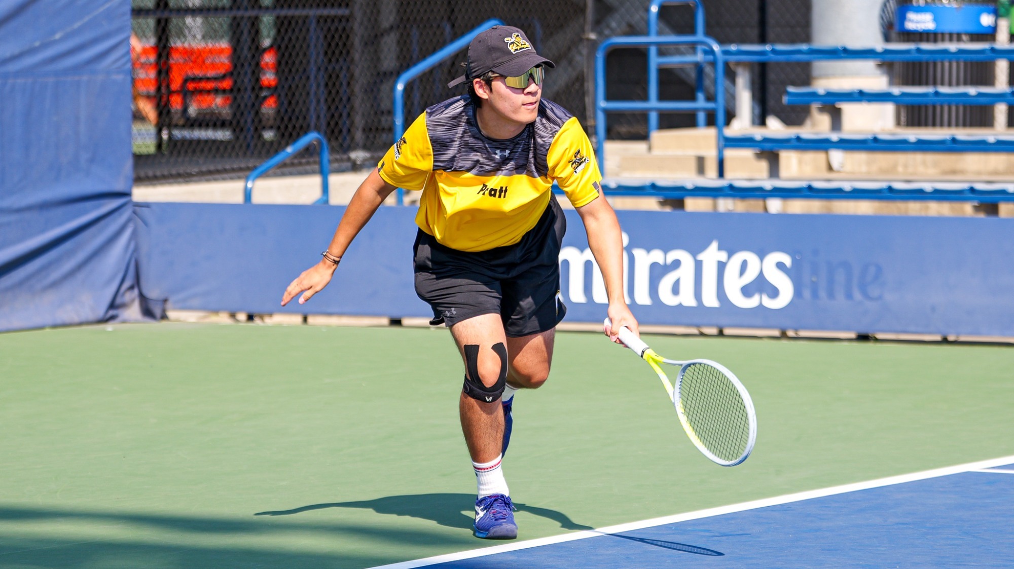 Nathan Park follows through on a serve