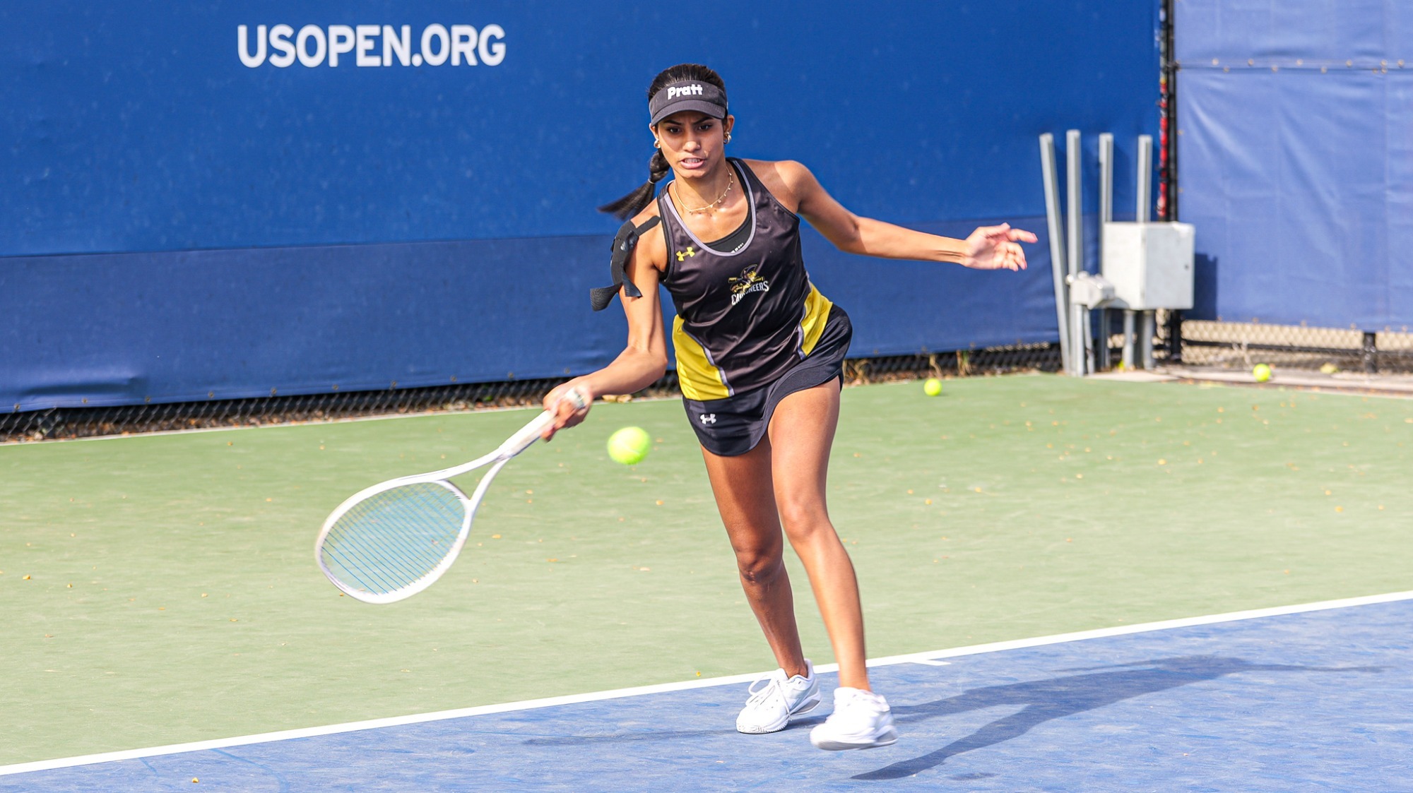 Pallavi Verghese hits a forehand.
