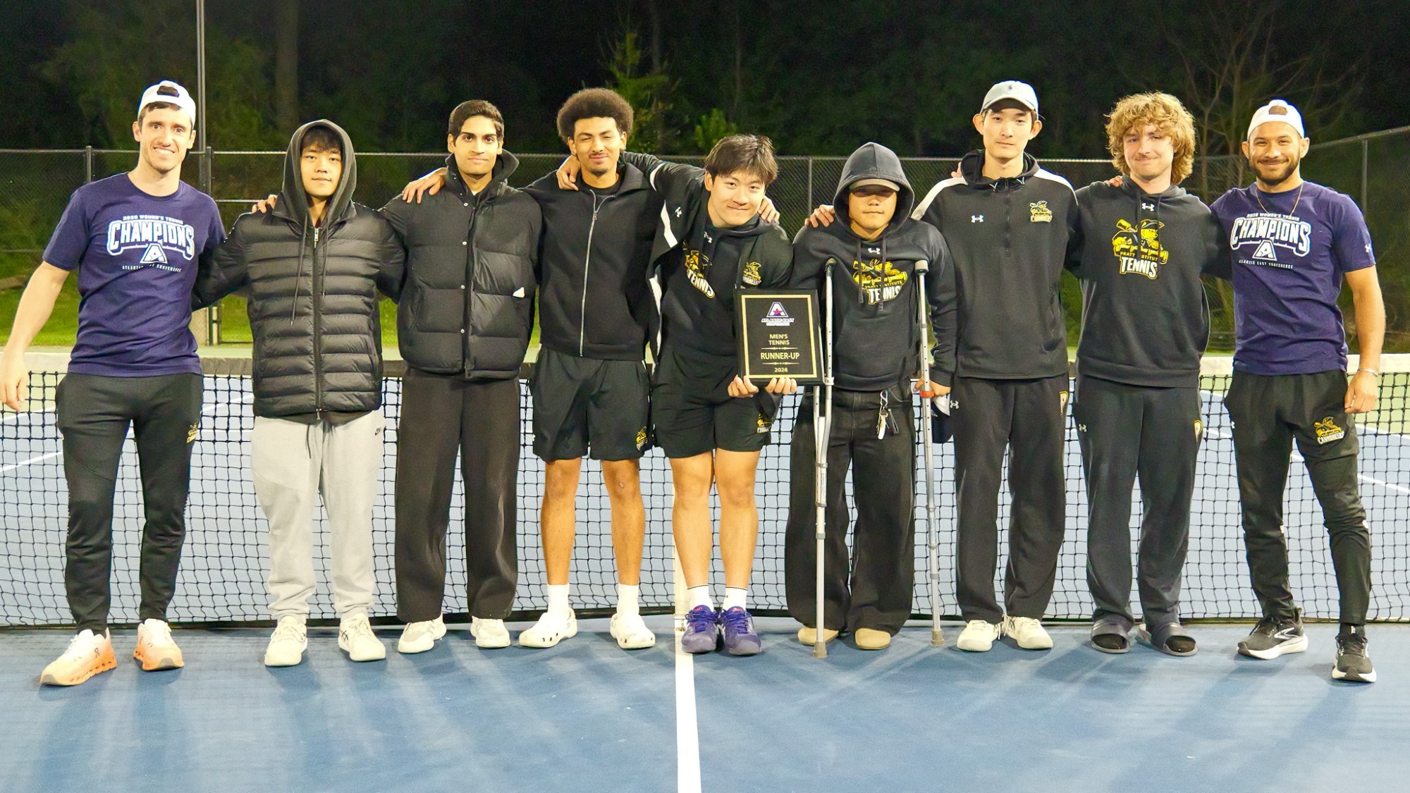 Men's Tennis with their runner-up plaque at after the 2026 Atlantic East Conference Championship
