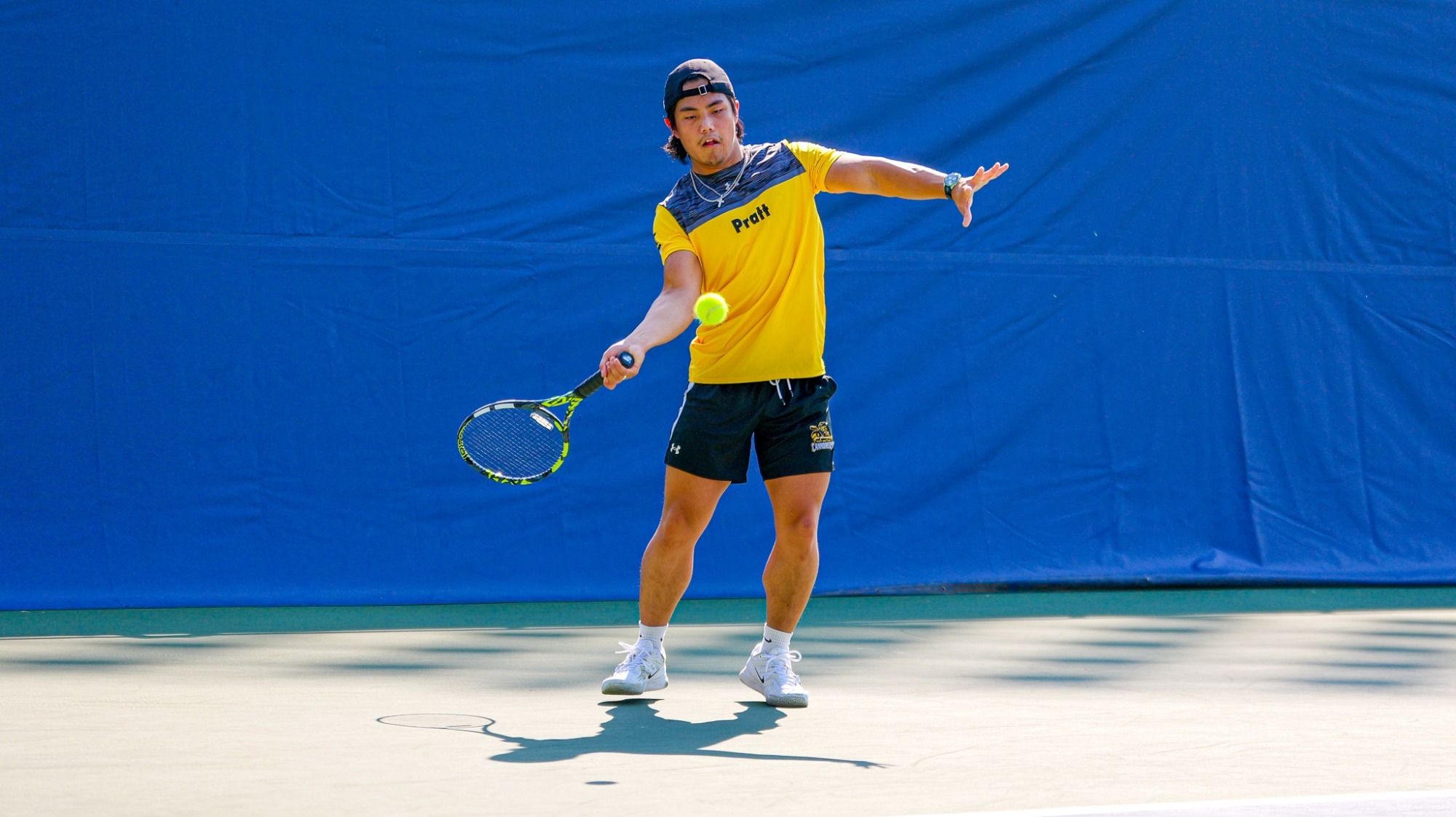 Mikah Liu hits a forehand