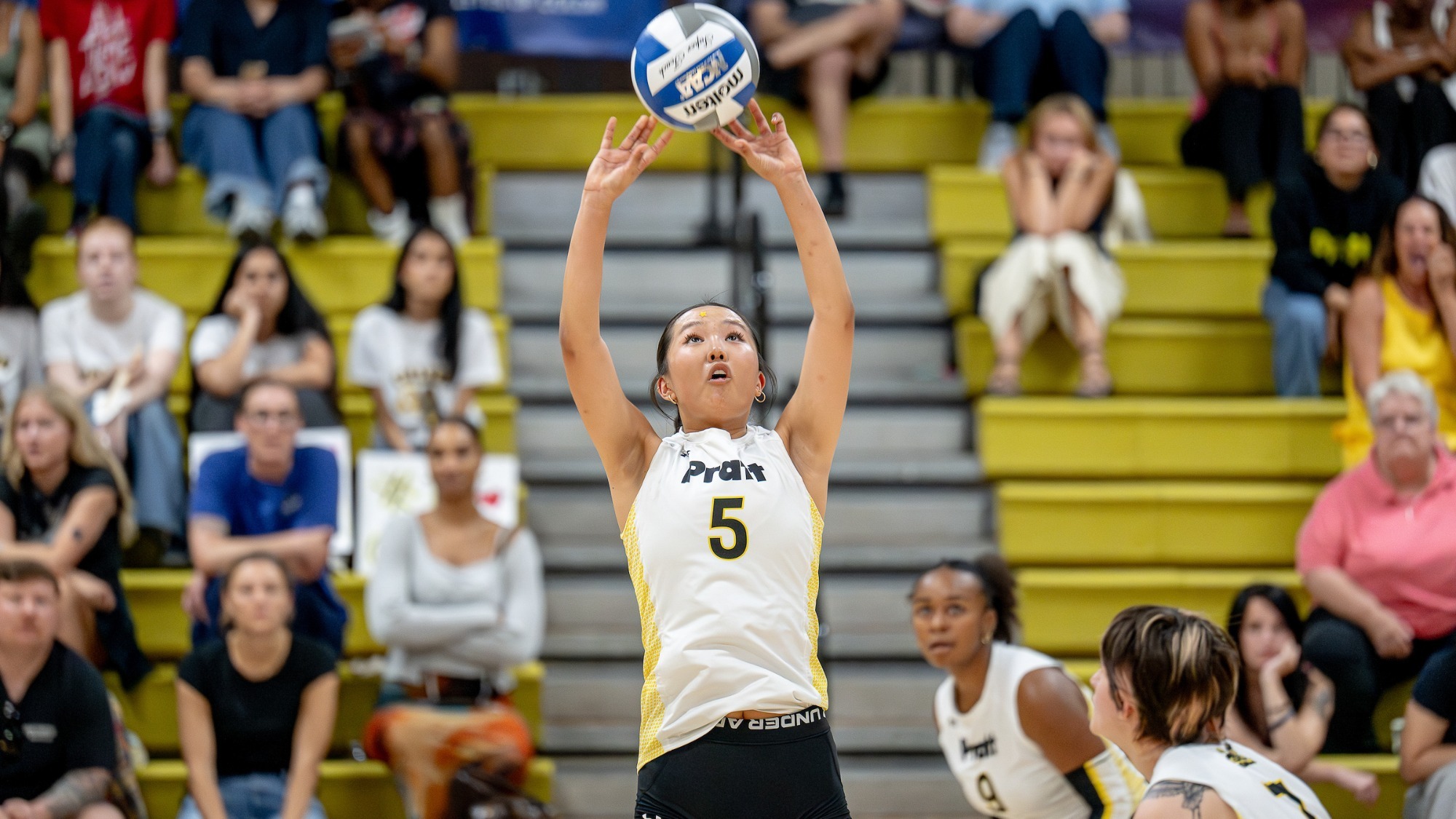 Emma Hwang sets the ball