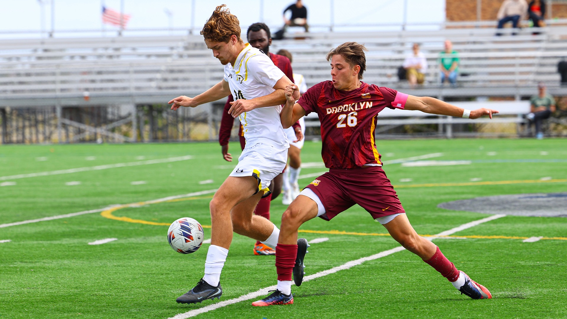 Pavel Emam shields off a Brooklyn defender.