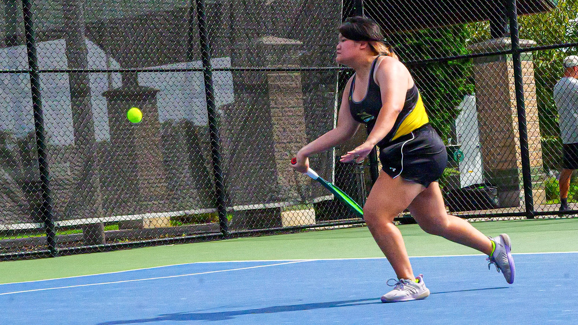 Elva Yu hits a forehand