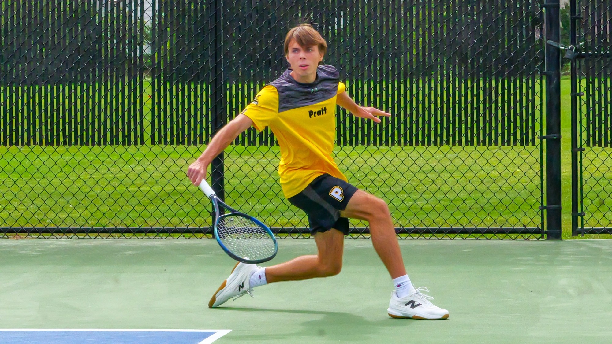Peter Burnham hits a backhand.