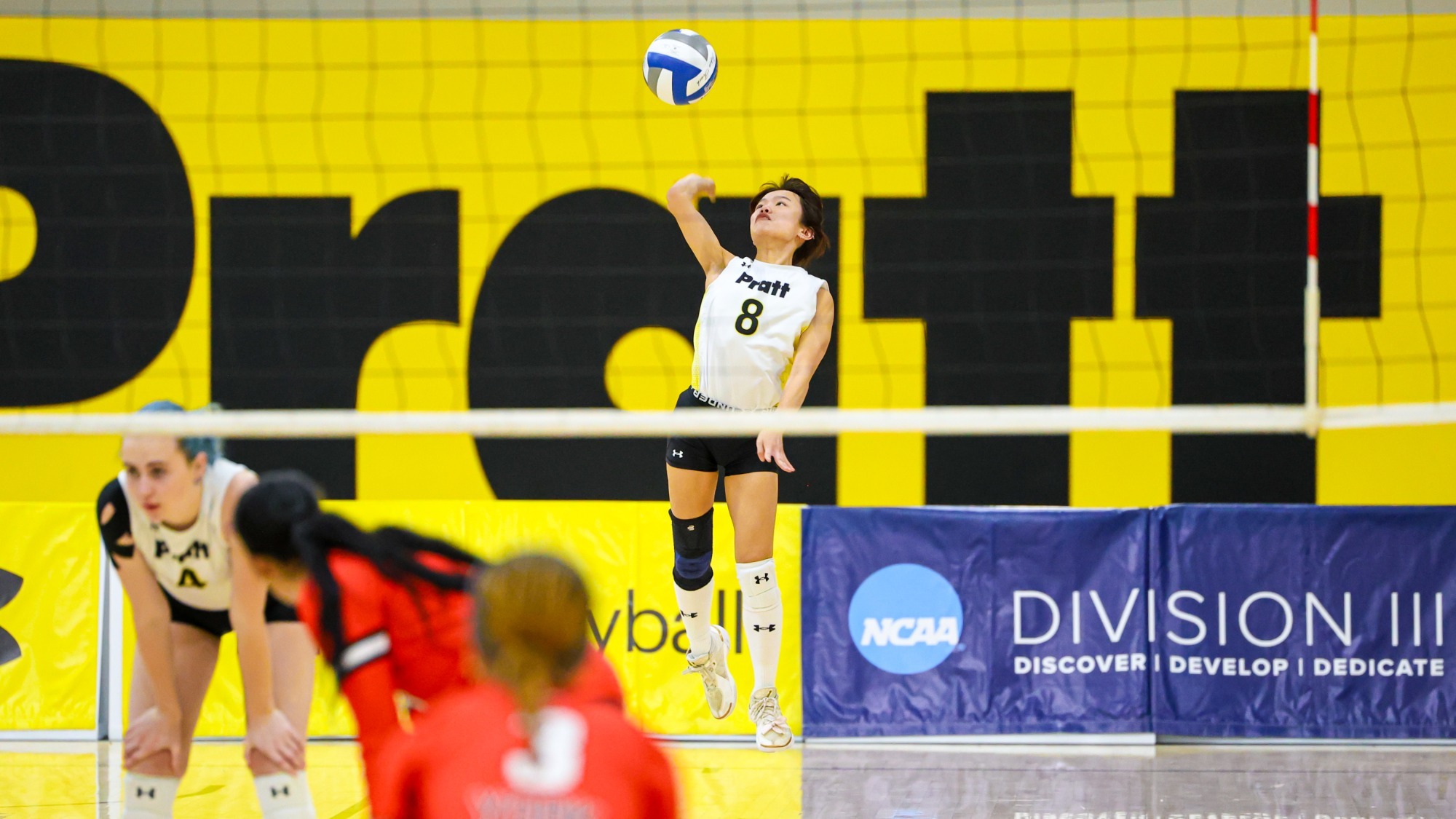 Angelina Chung serves
