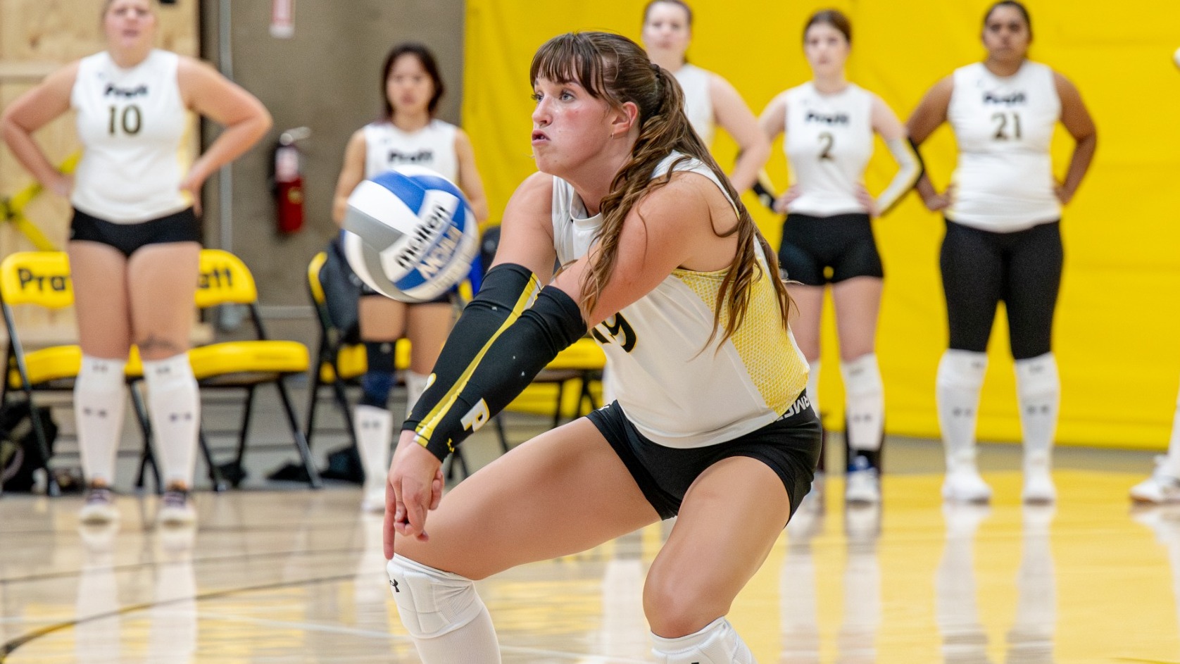 Colleen Russell bumps a ball
