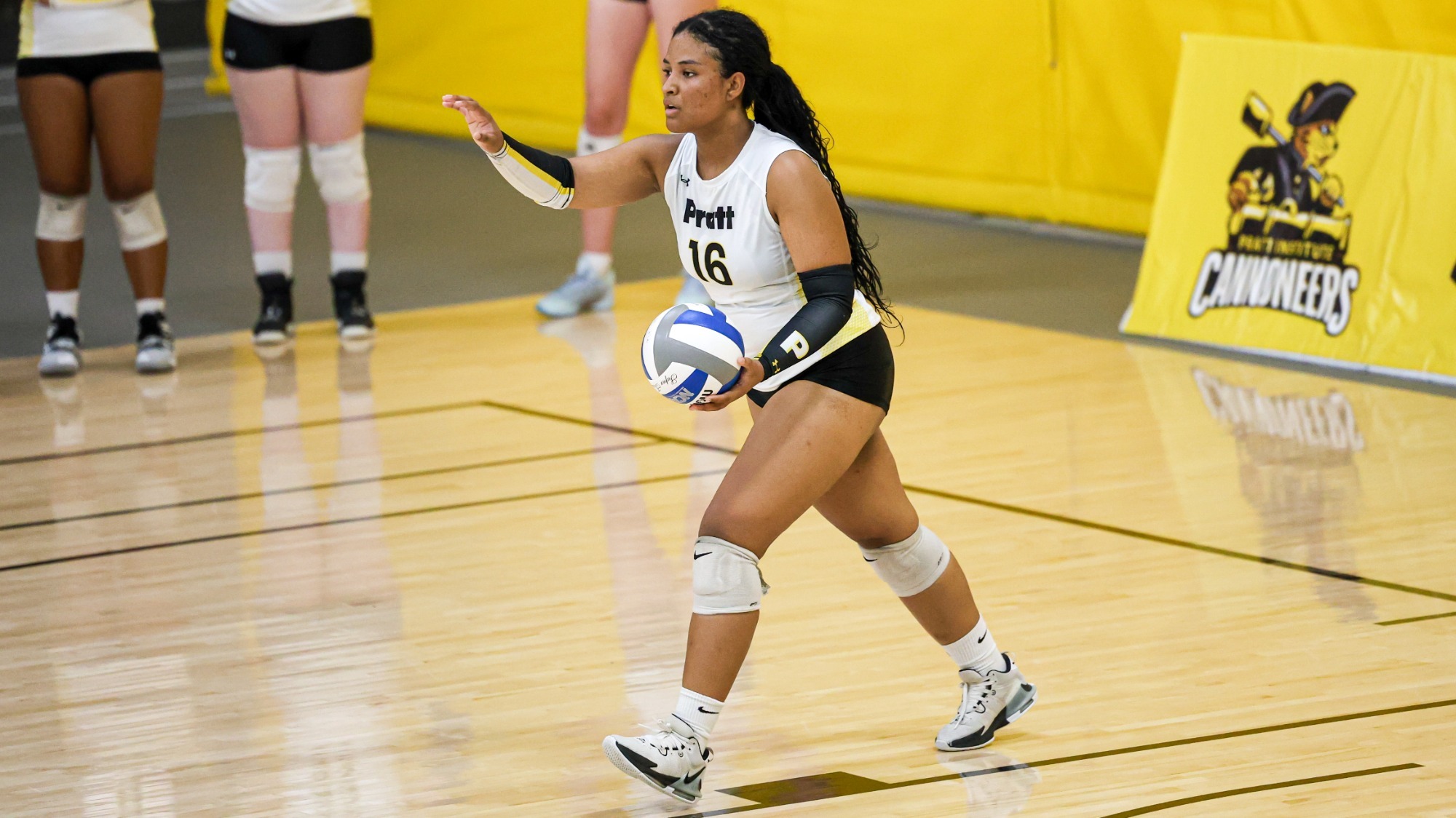 Kelsy Padilla readies to serve