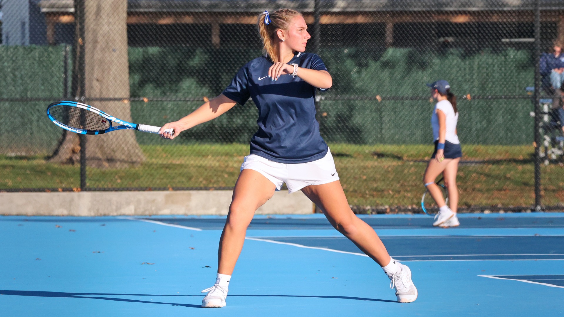 kiersten strohecker prepares to return a serve during a match against penn state altoona in 2025