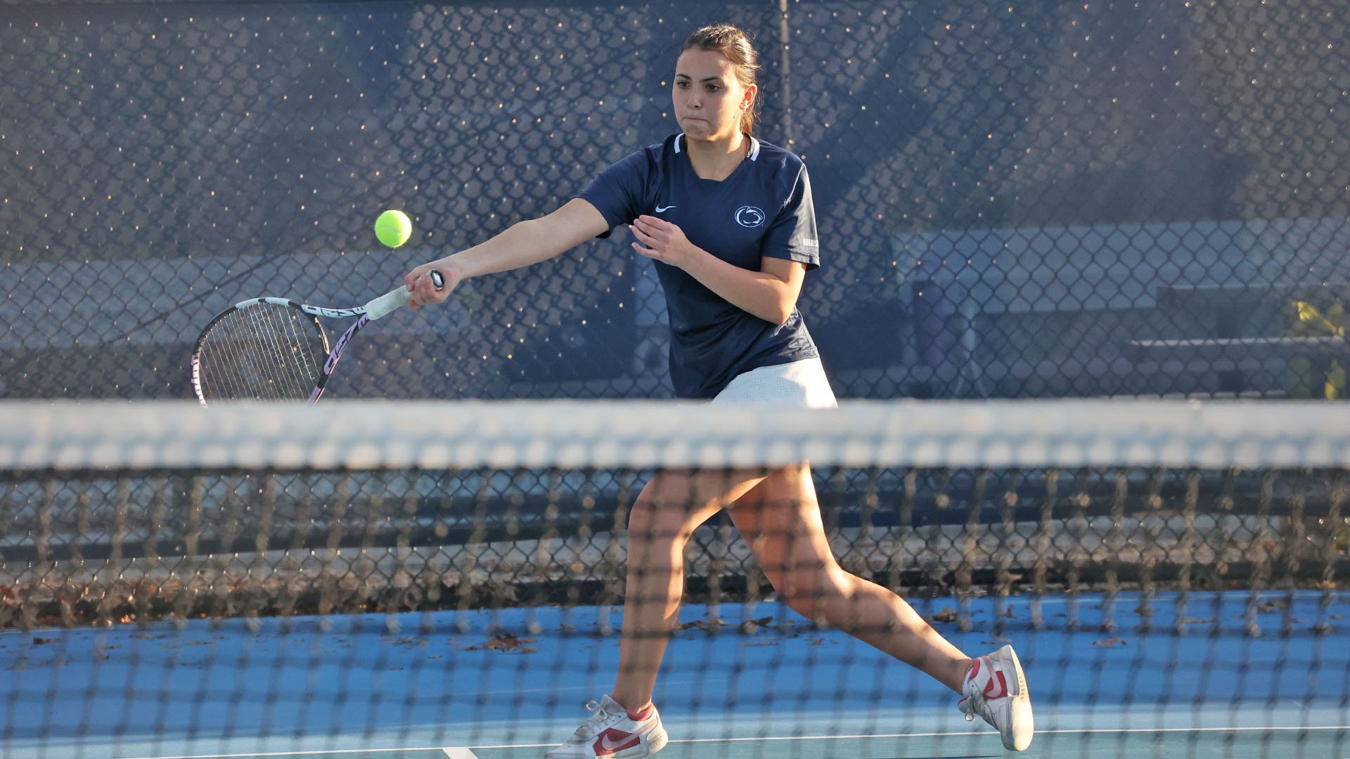 Rosalia Mannino hits a ball in a match against penn state altoona