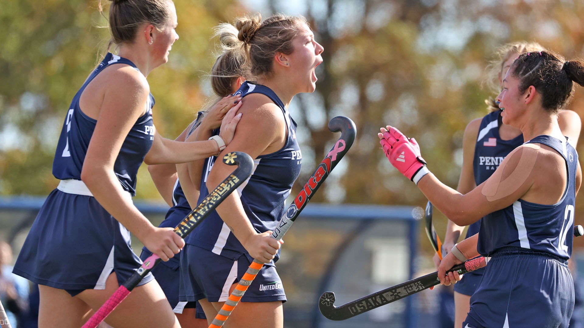 anna moyer celebrates with the penn state harrisburg field hockey team after scoring a goal in the united east semifinal