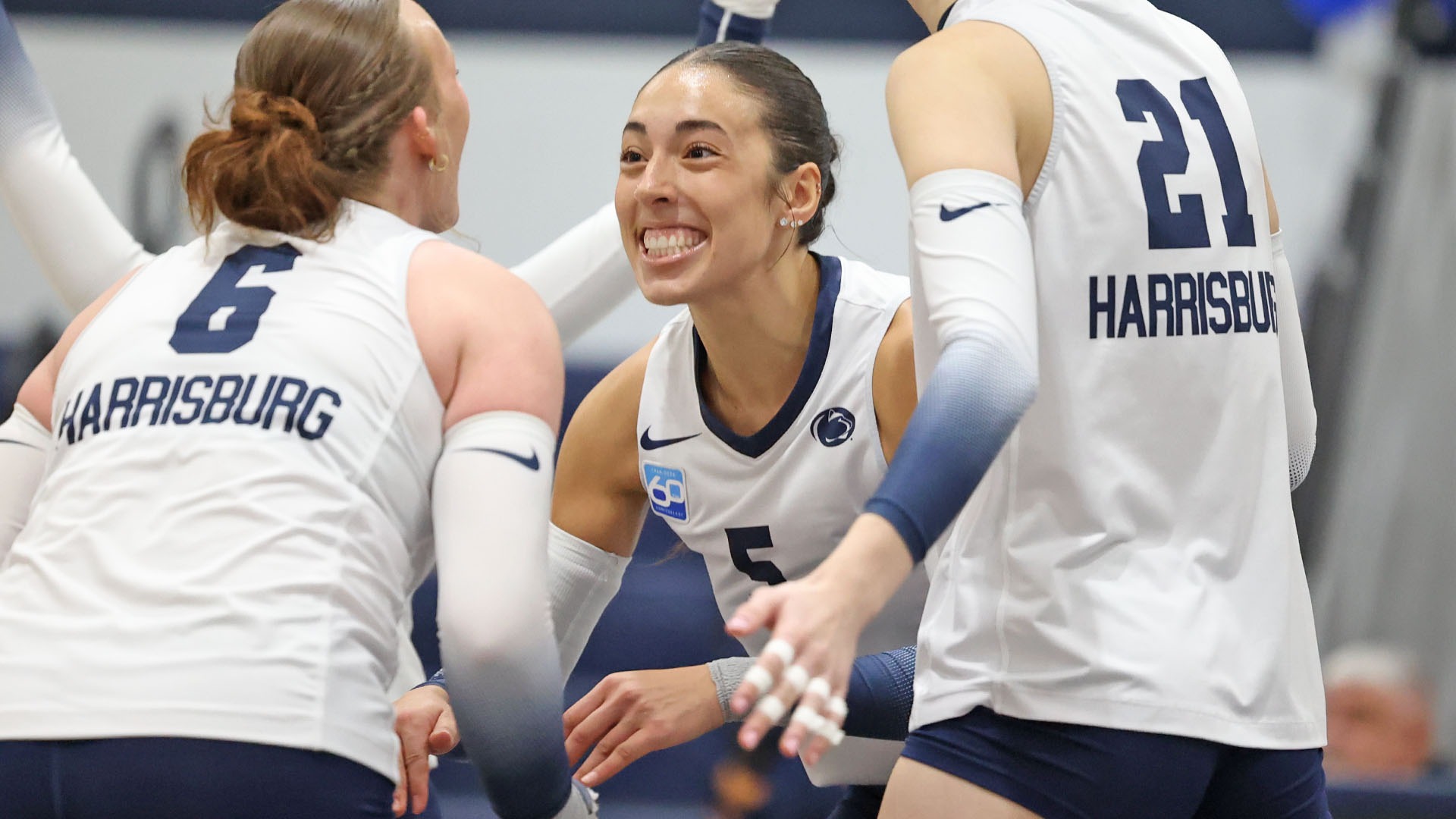 brianna ondishin ribon celebrates with her teammates in a contest against rosemont