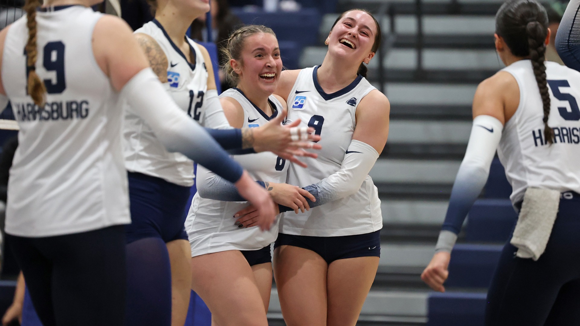 mackenzy miller and hannah degregory celebrate with their teammates in the united east semifinal
