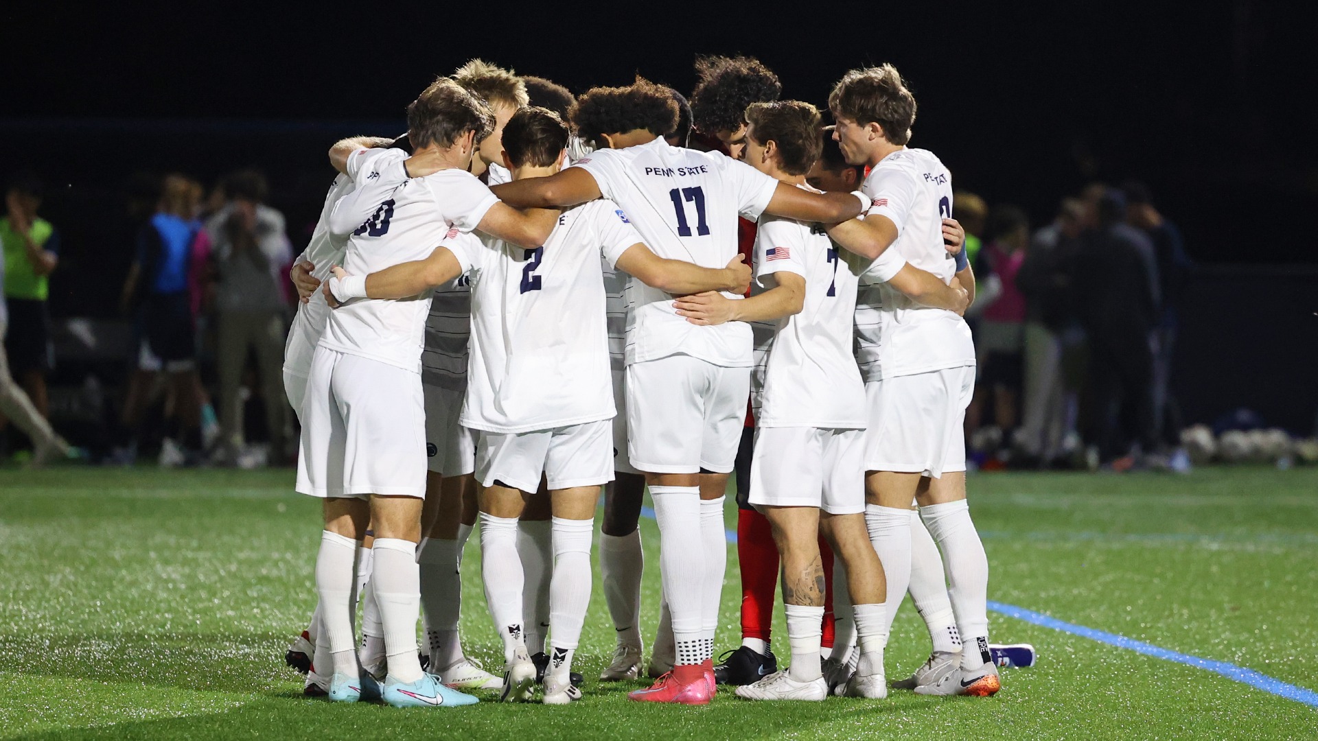 men's soccer players huddle up before a postseason game against penn state abington in 2025