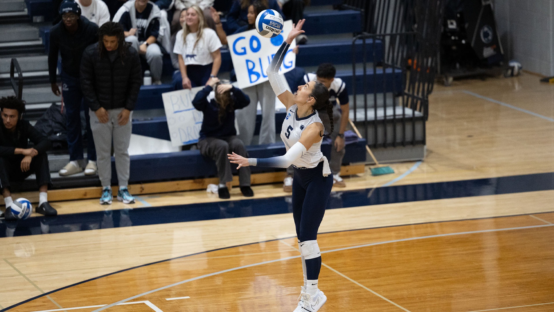 brianna ondishin ribon hits a serve in the united east championship game against st marys