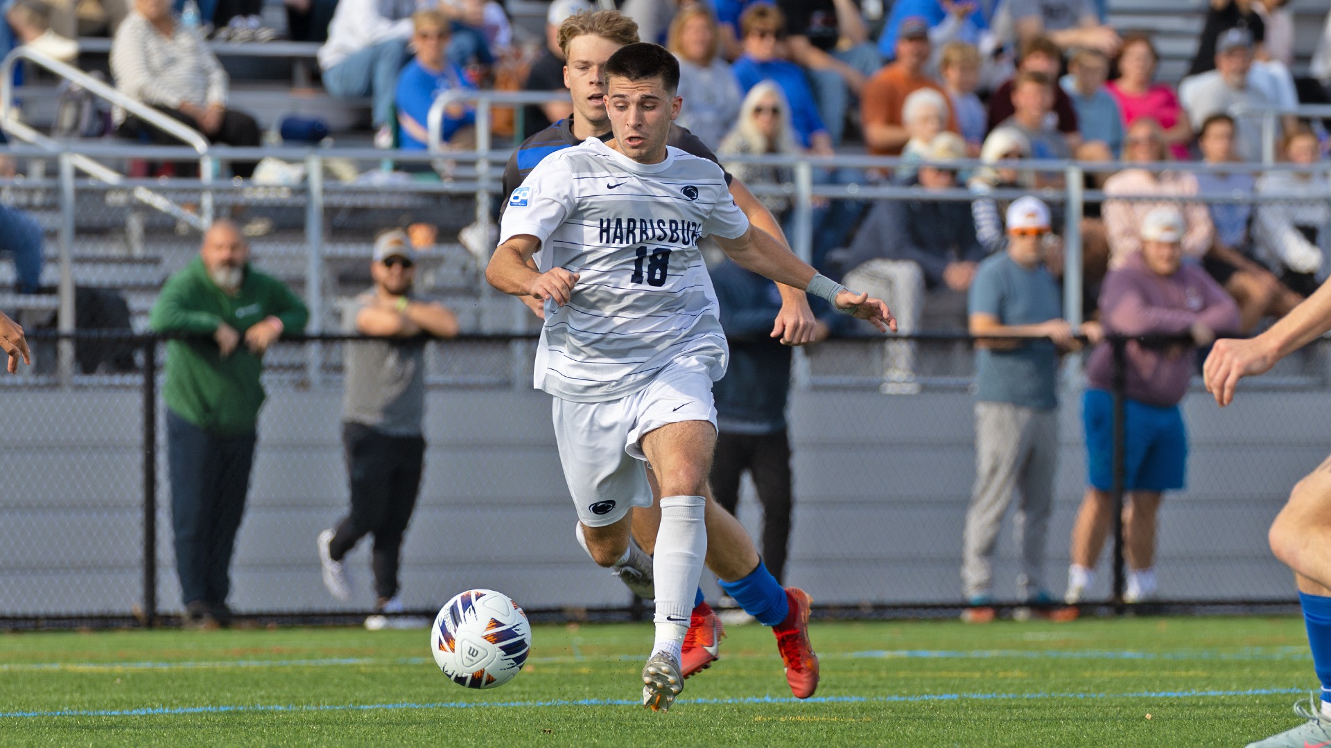 aidan mcwilliams dribbles past a defender during the united east championship game in 2025