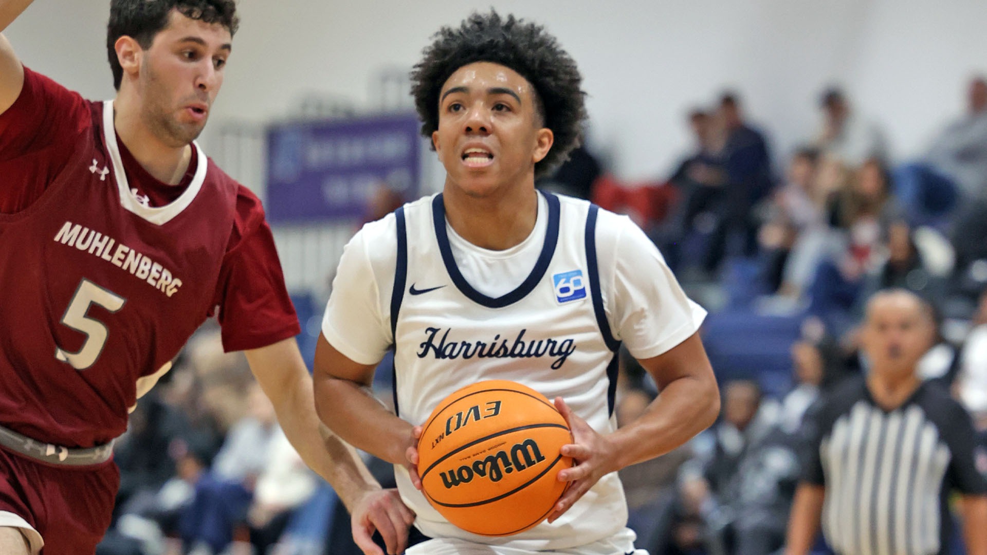 kj lucas drives to the hoop in a win over muhlenberg at the capital union building