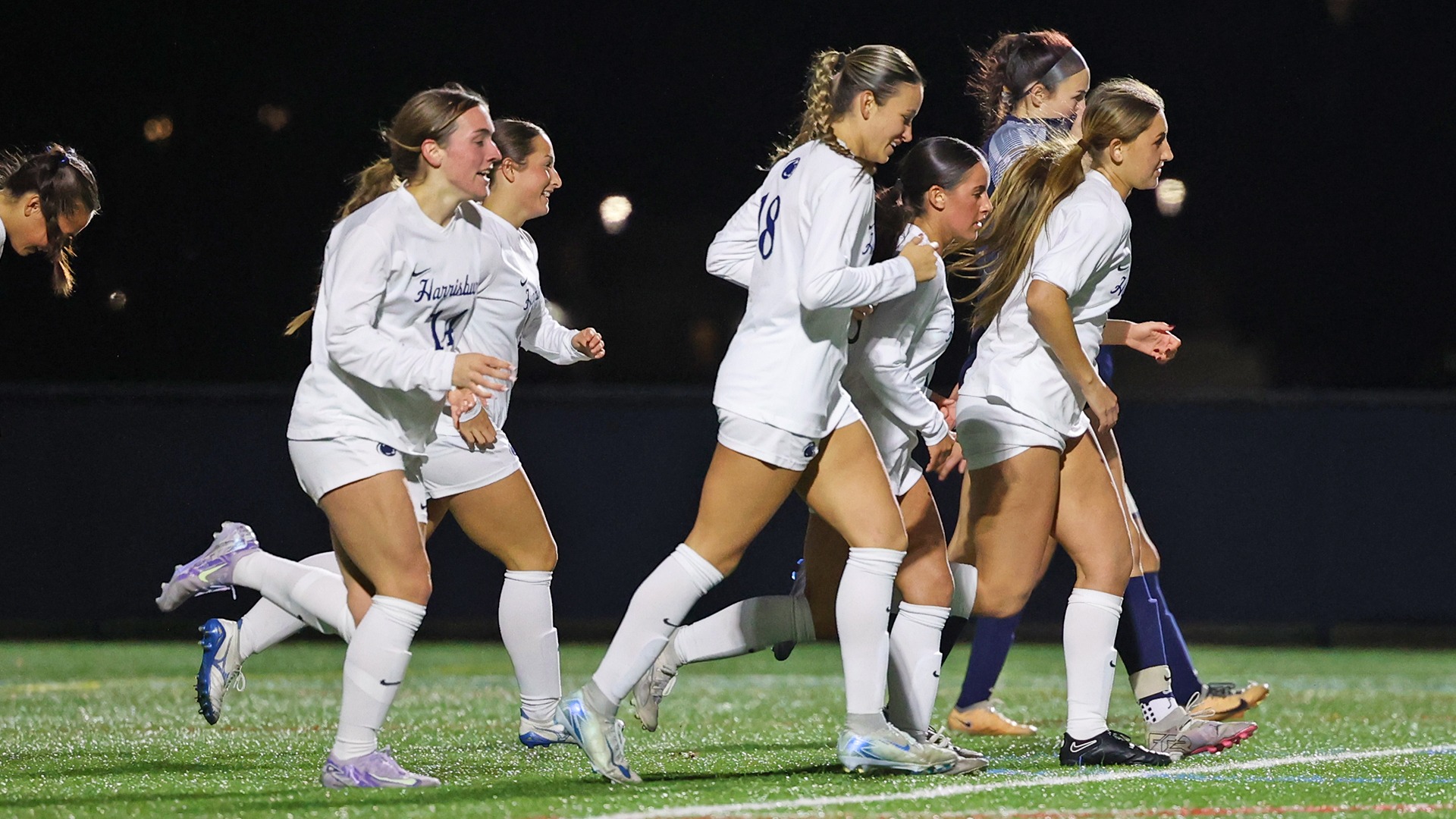 women's soccer players run to midfield after scoring a goal in a win over penn state berks in 2025