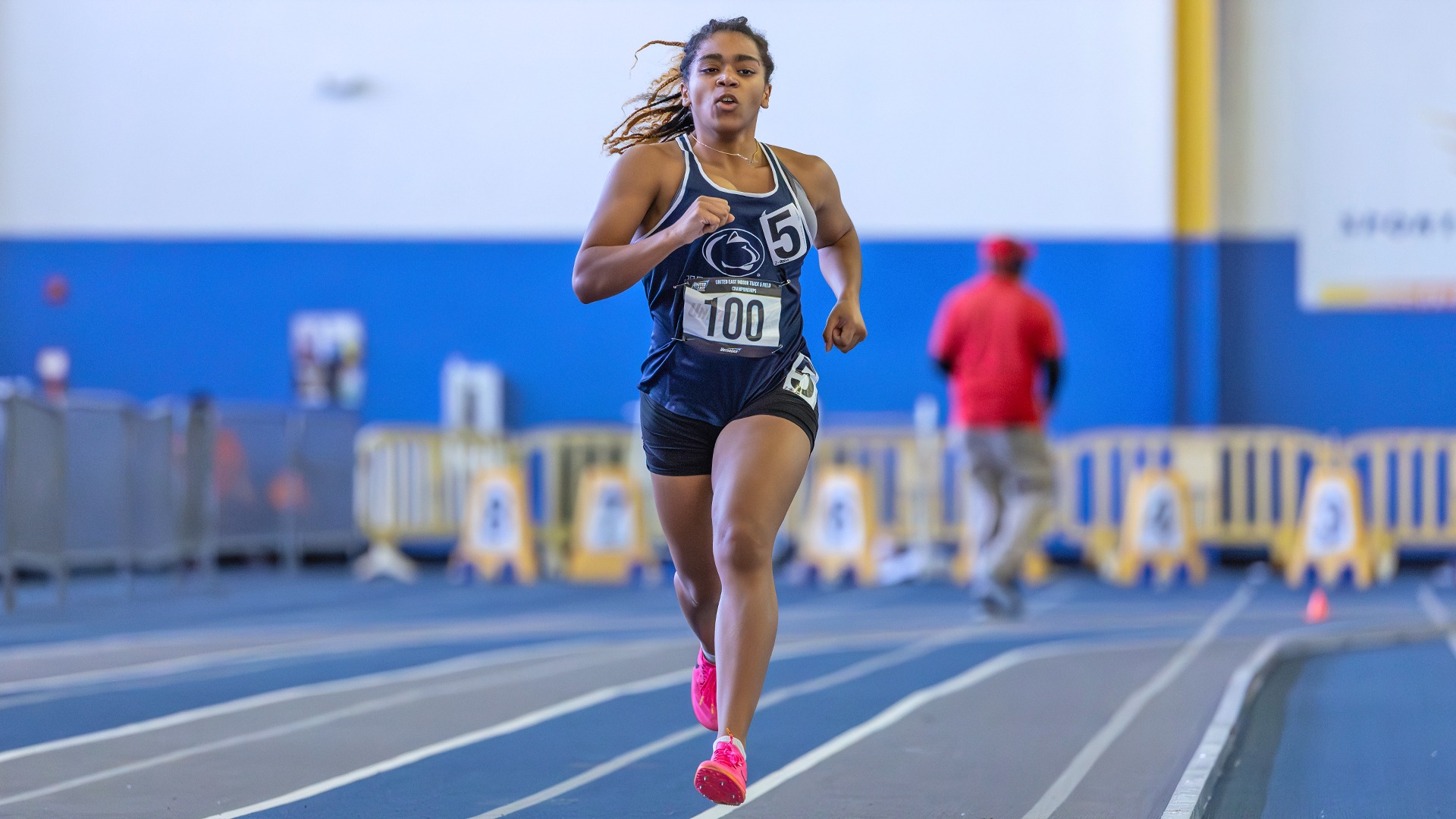 destiny samuels rounds the track during the united east indoor championships in 2025