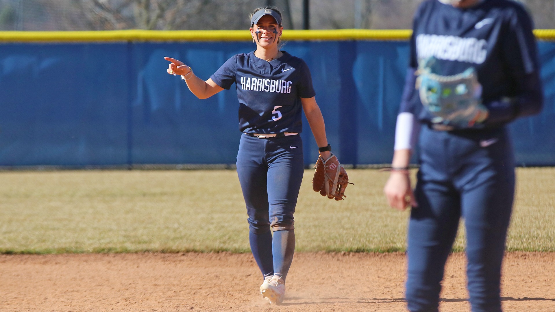 maddy lehigh smiles and points at shortstop during a win at elizabethtown in 2025