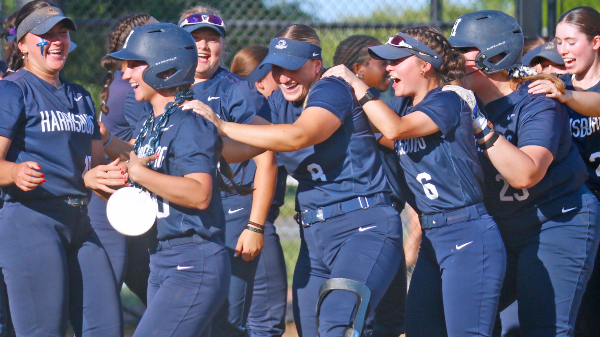 softball players celebrate after an aspen walker home run in a united east championship victory in 2025