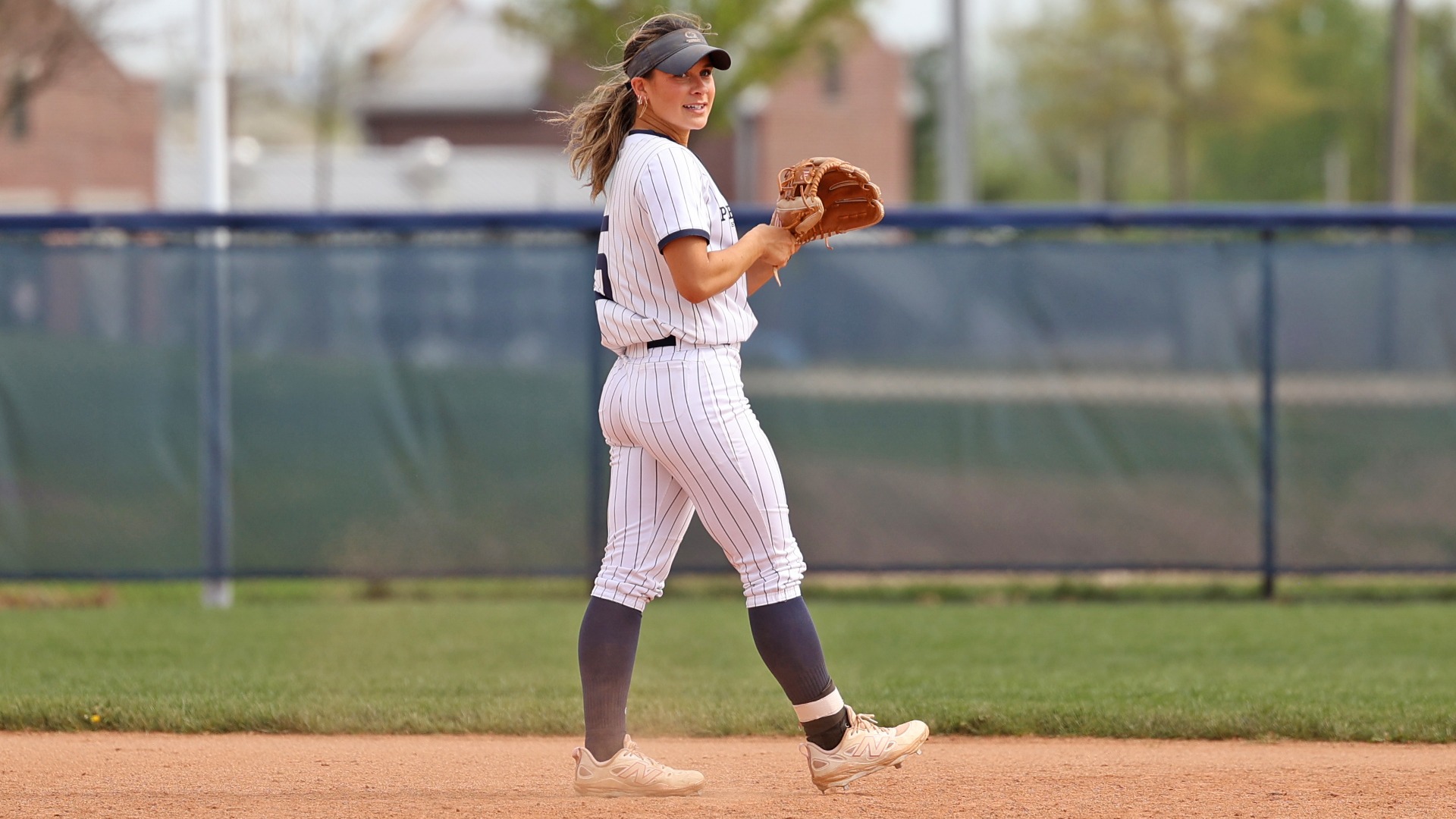 maddy lehigh smiles as she heads back to her shortstop position during a win over keystone in 2025