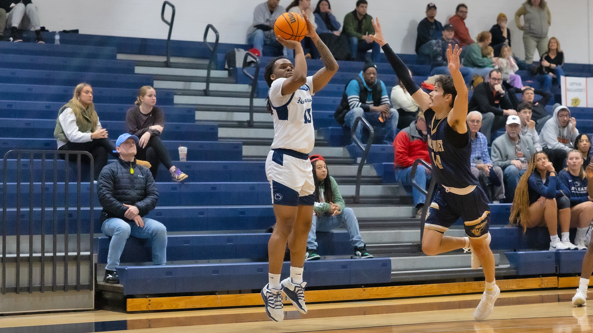 elija eccleston shoots a corner 3-pointer in a win over gallaudet in 2026