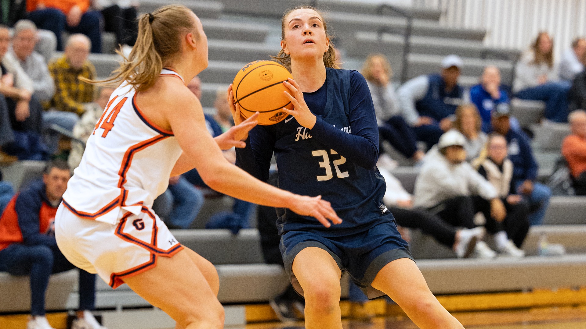 lauren moffatt shields the ball from a defender during a game at gettysburg in 2025