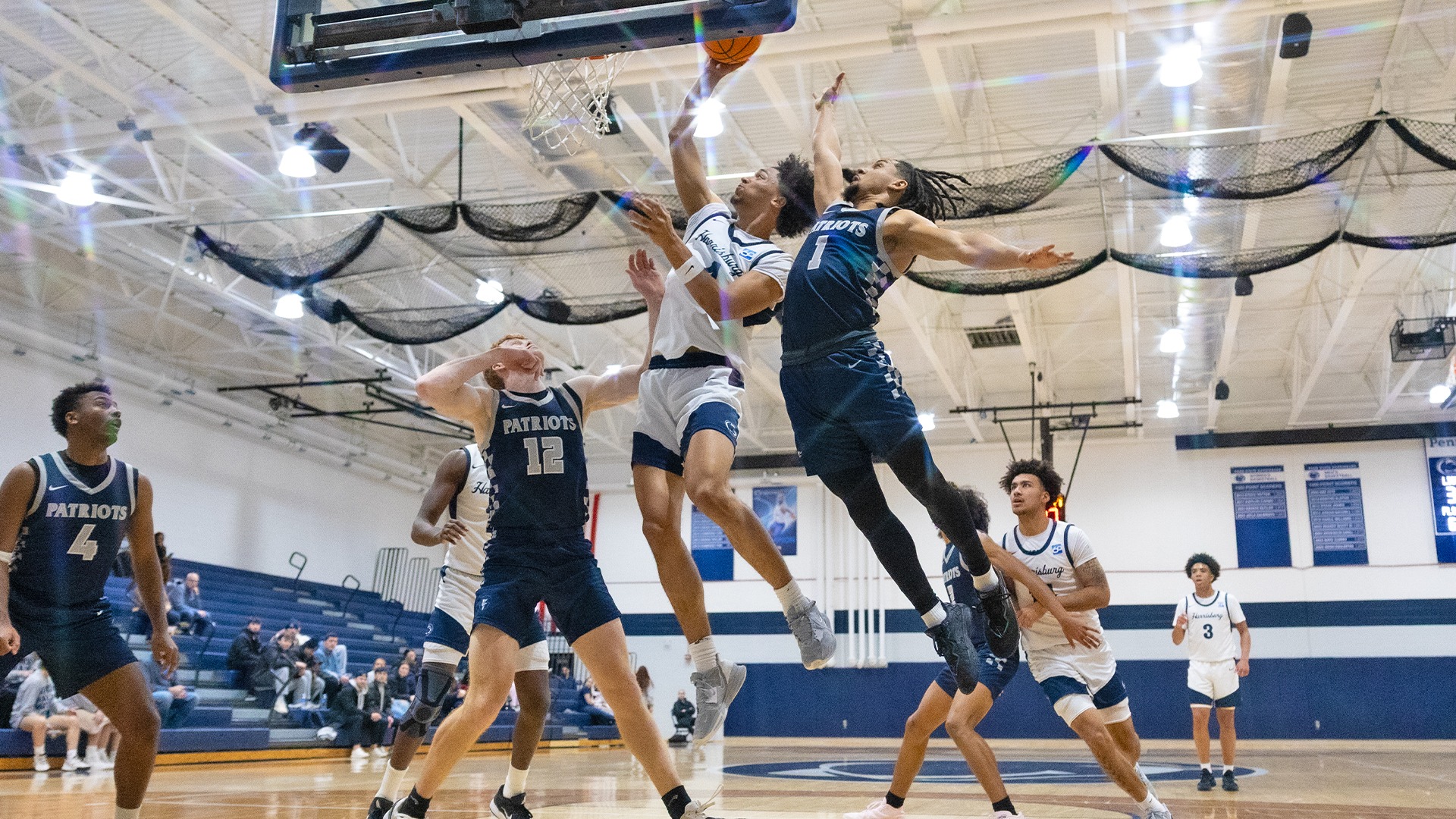 dylan moore goes up for a contested layup during win over valley forge in 2026