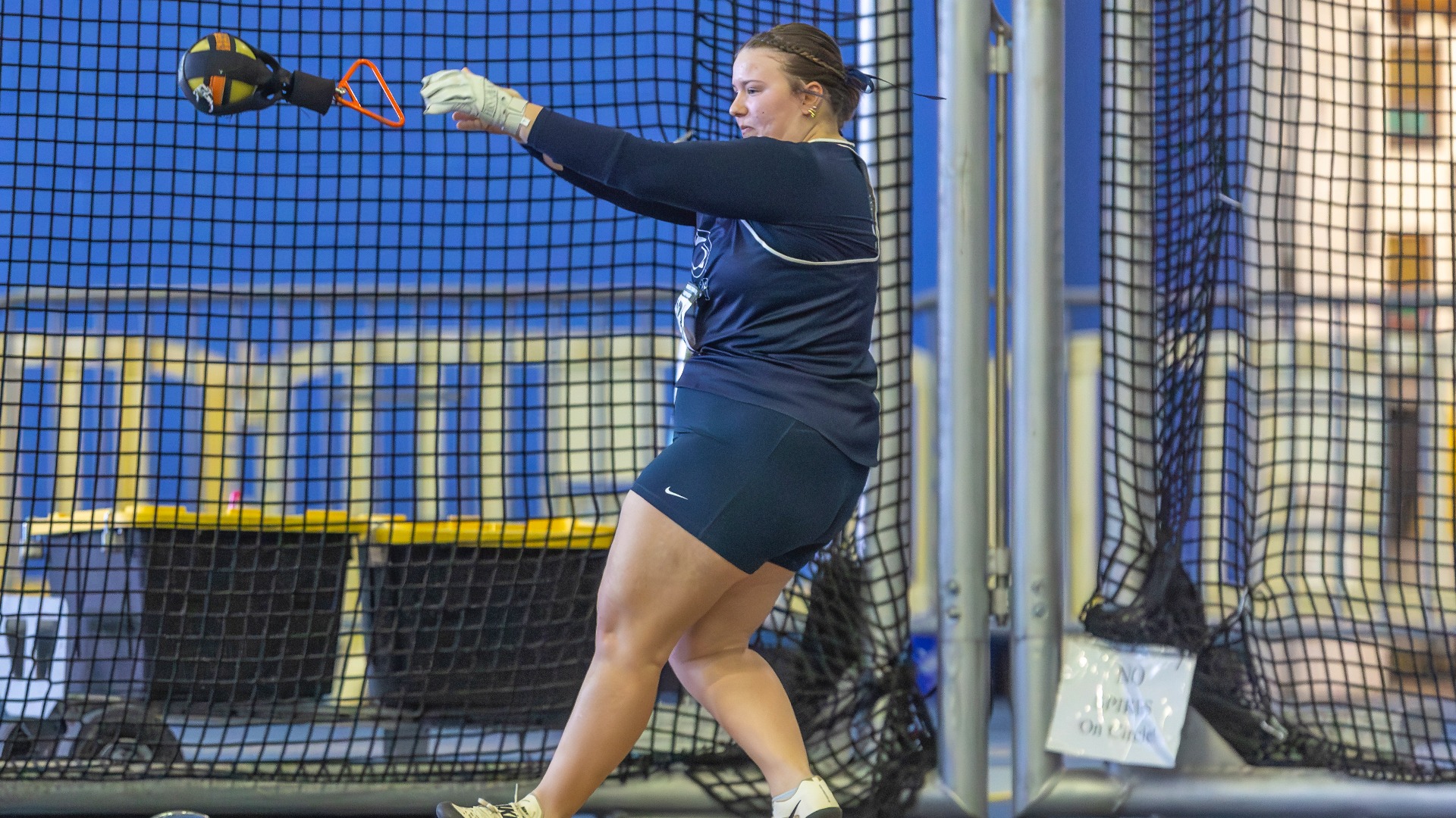 elaina torta makes a weight throw attempt during the 2025 united east indoor track & field championships