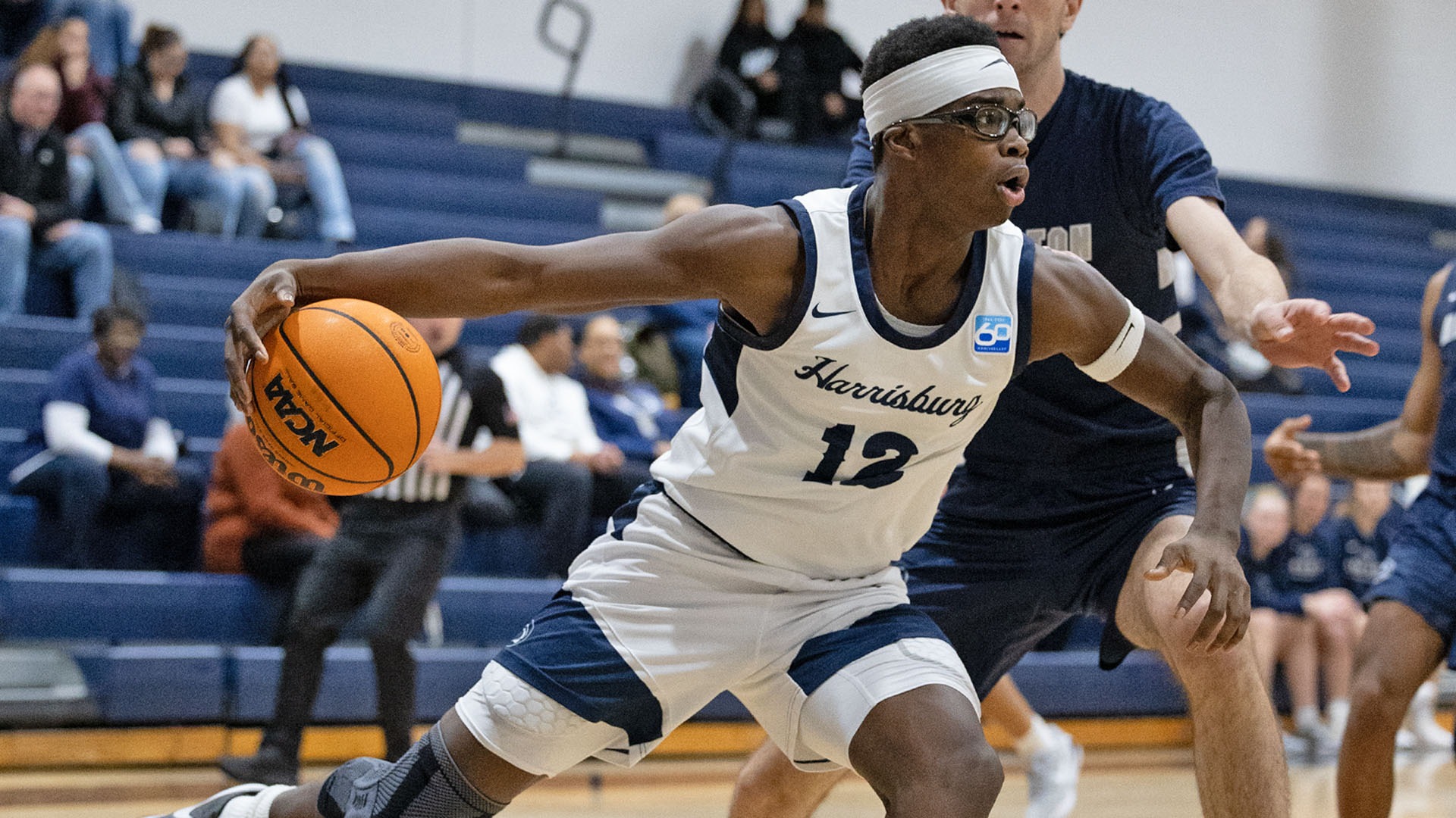 jordan spencer drives to the hoop in a win against penn state abington
