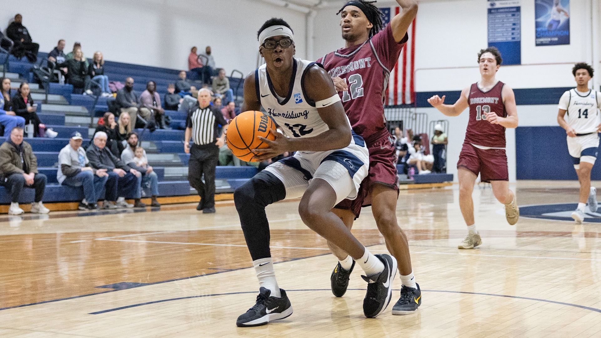 jordan spencer holds the ball in a win over rosemont at the capital union building