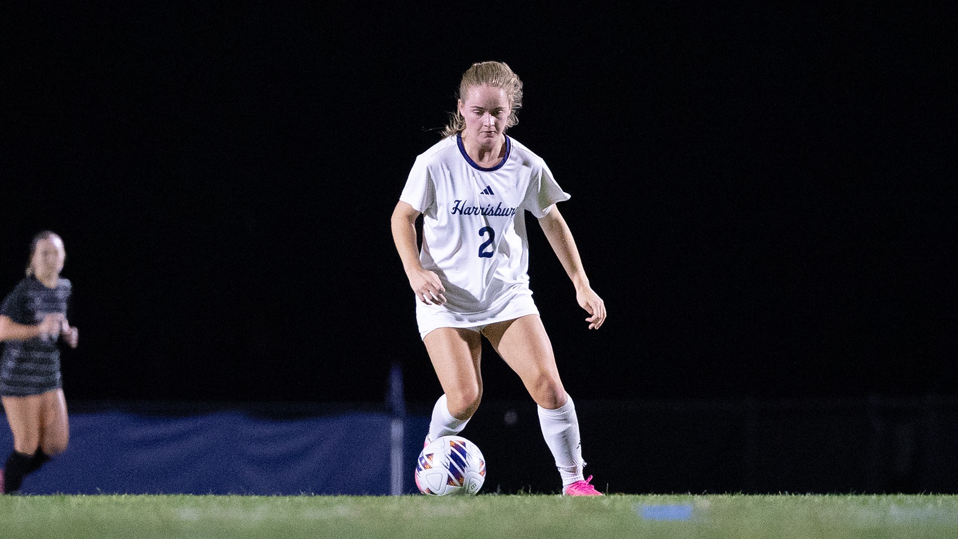 abigail mahaffey dribbles the ball down the field against penn college in 2026