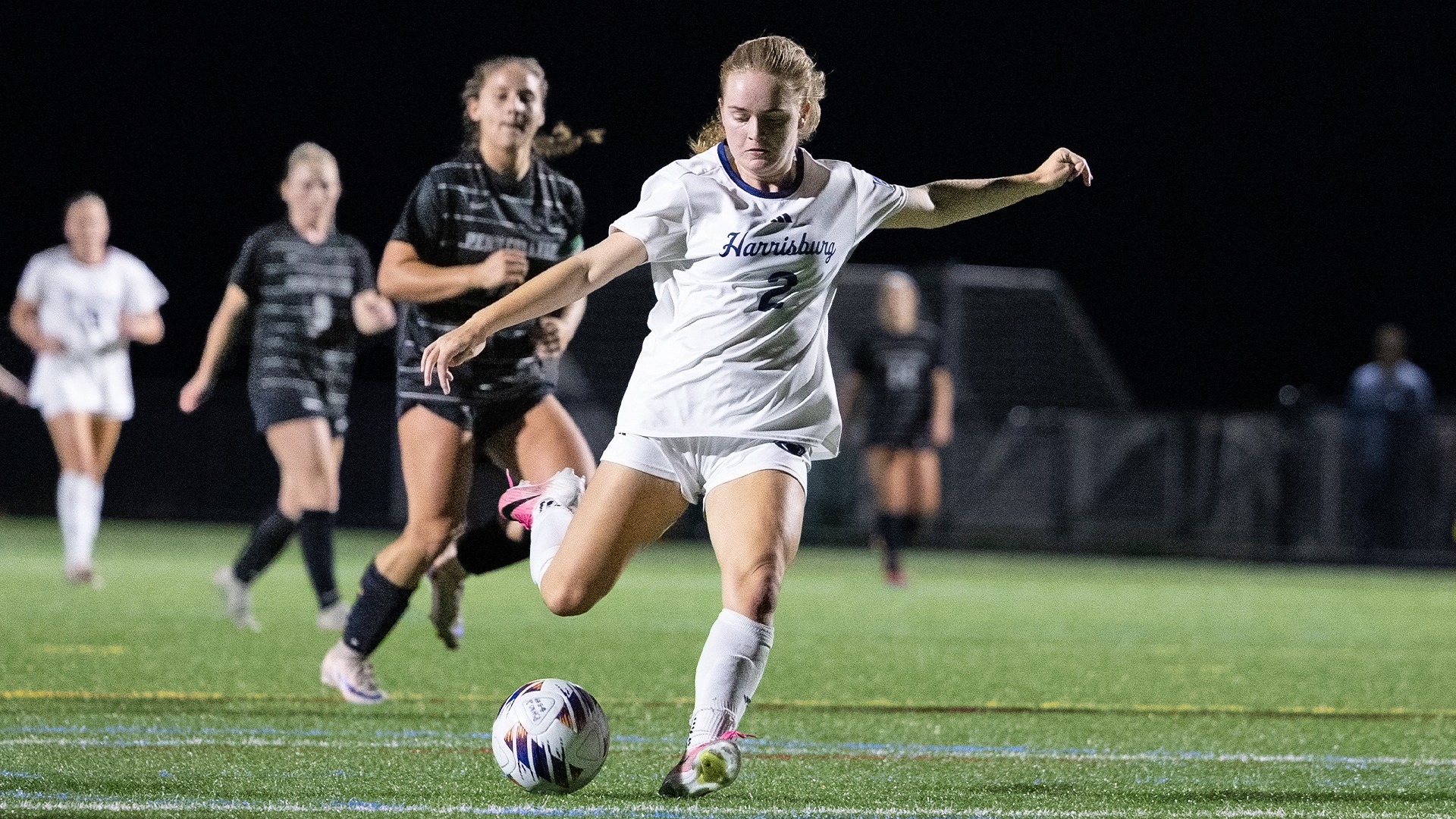 abigail mahaffey dribbles the ball down the field against penn college in 2026