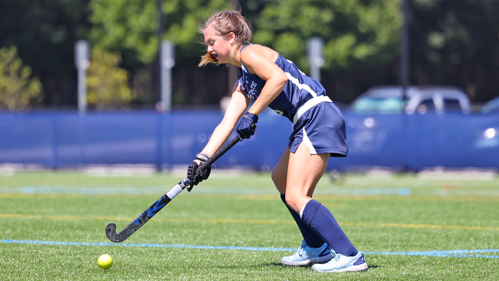 sara yeselavage gathers a ball during a win over goucher in 2025