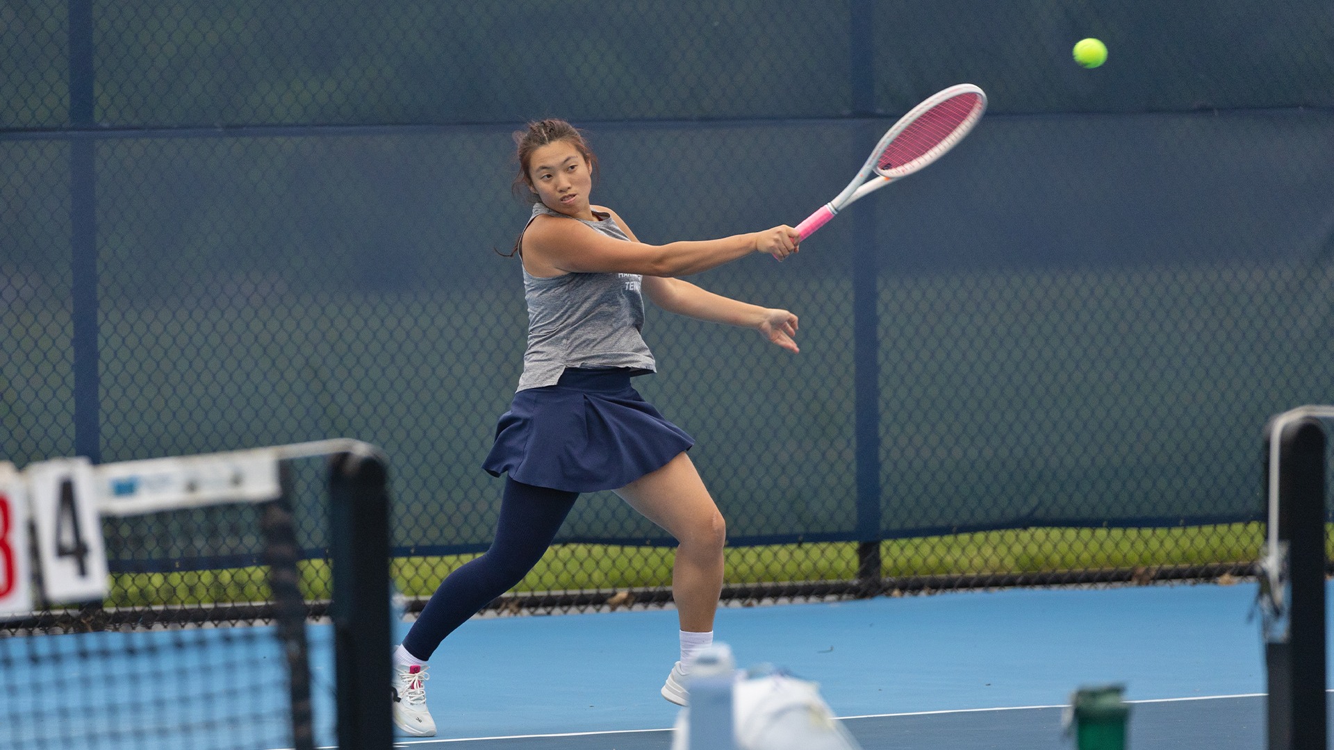 karino ko hits the ball over the fence in a match in the spring of 2026