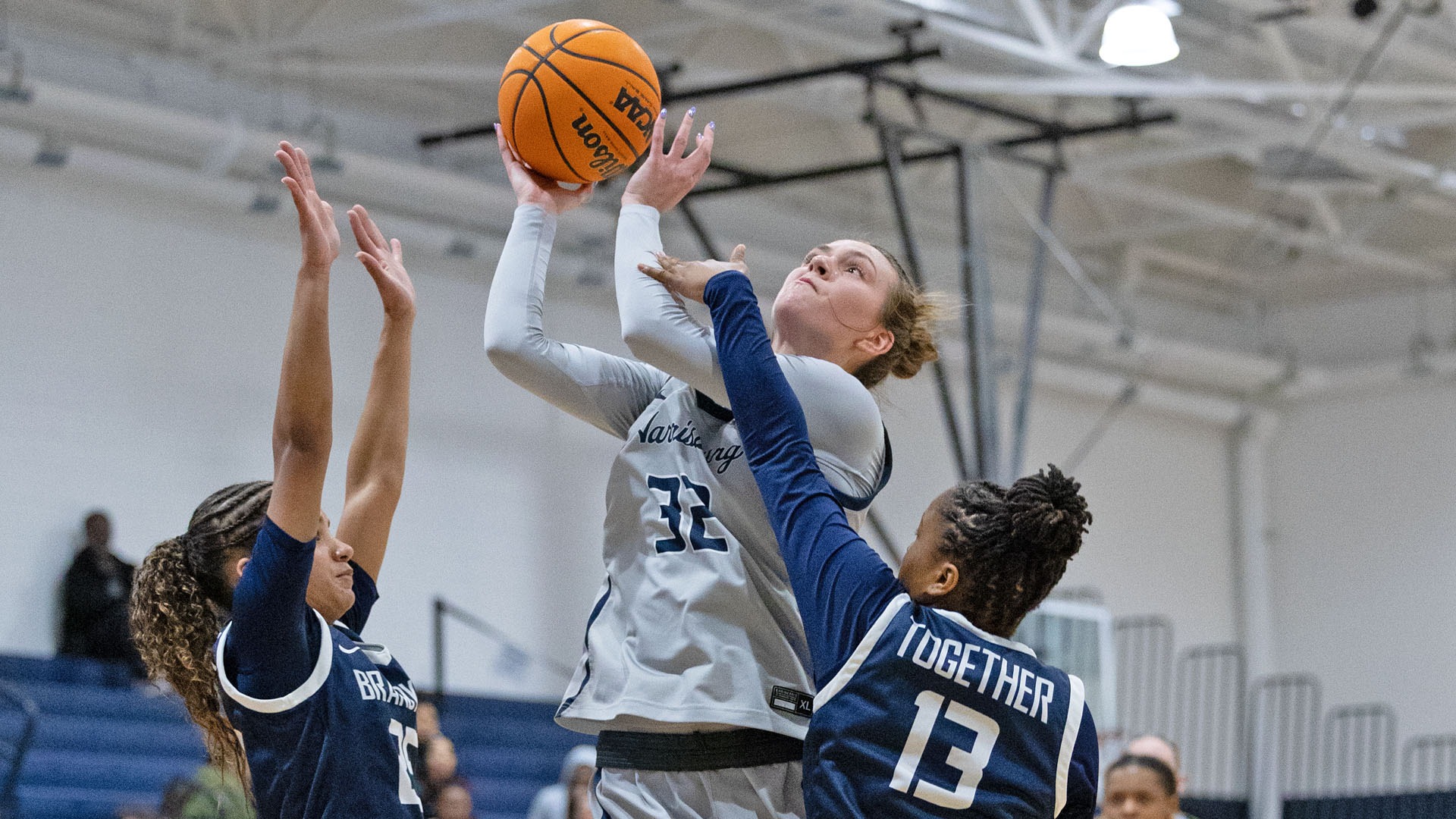 lauren moffatt drives to the hoop in a win over penn state brandywine at the capital union building