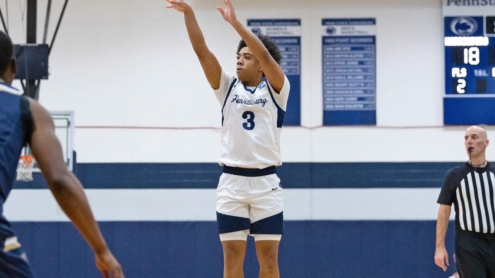 kj lucas shoots a 3-pointer during a win over gallaudet in 2026