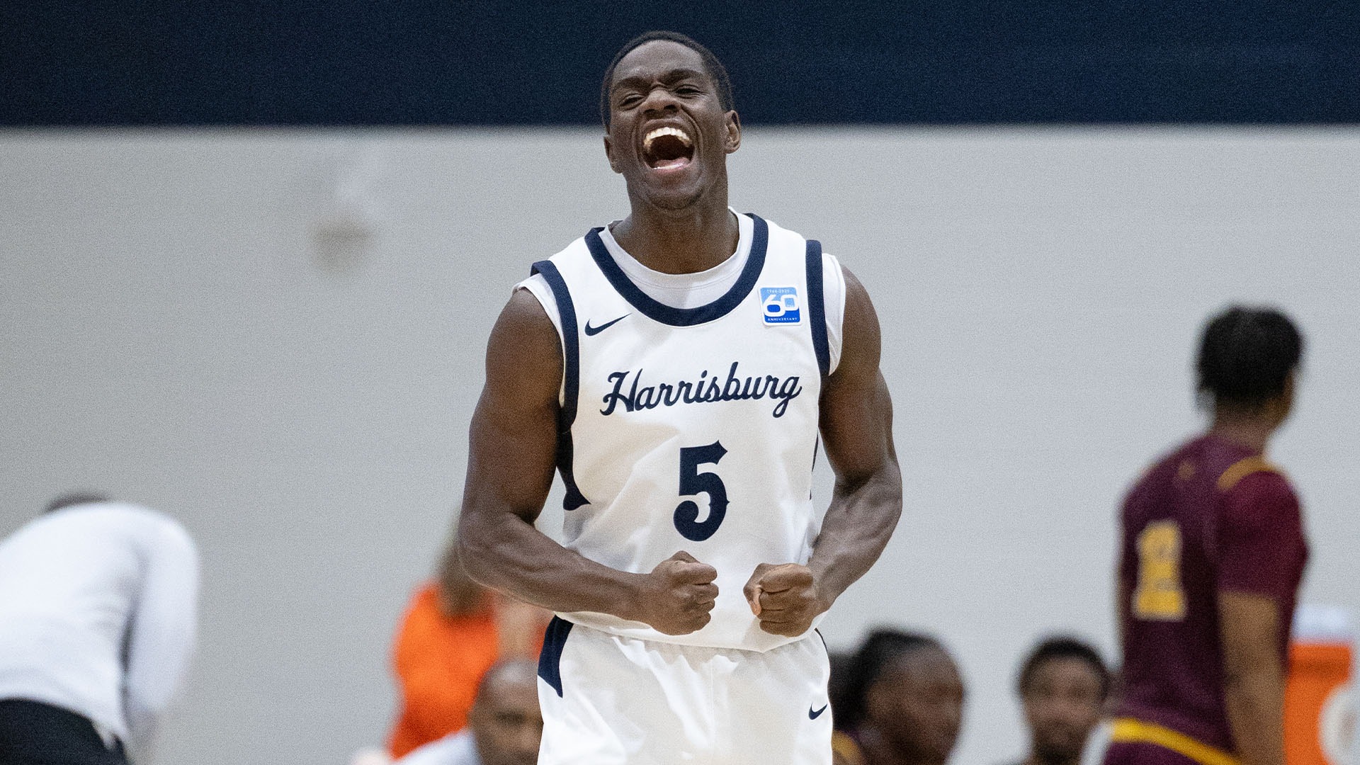 isaiah millien celebrates after scoring a point in a win over salisbury at the capital union building