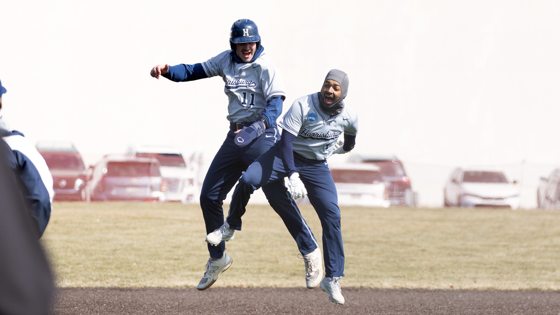 alex ruiz celebrates with demetre koutras after hitting a walkoff double in a win over umass dartmouth in 2026