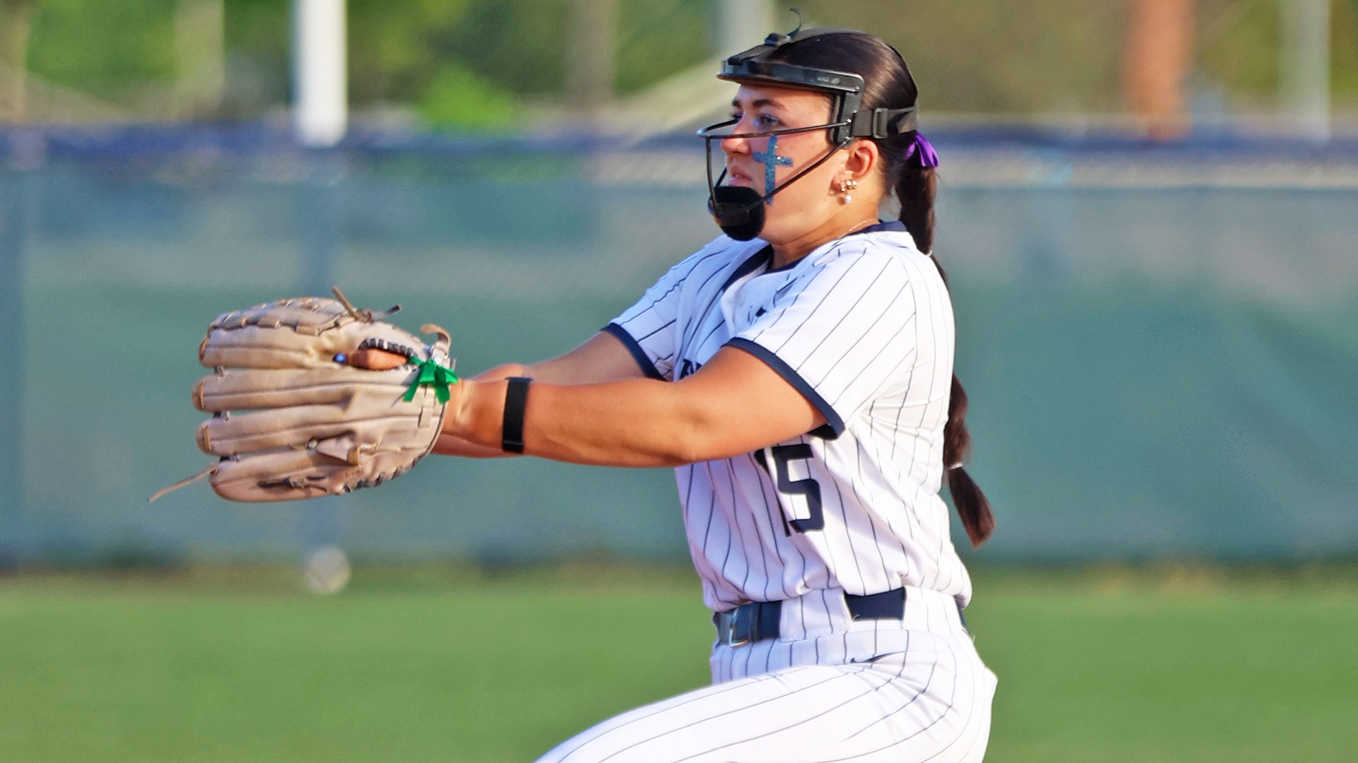 kierstyn smith winds up for a pitch during a playoff win over cedar crest in 2025