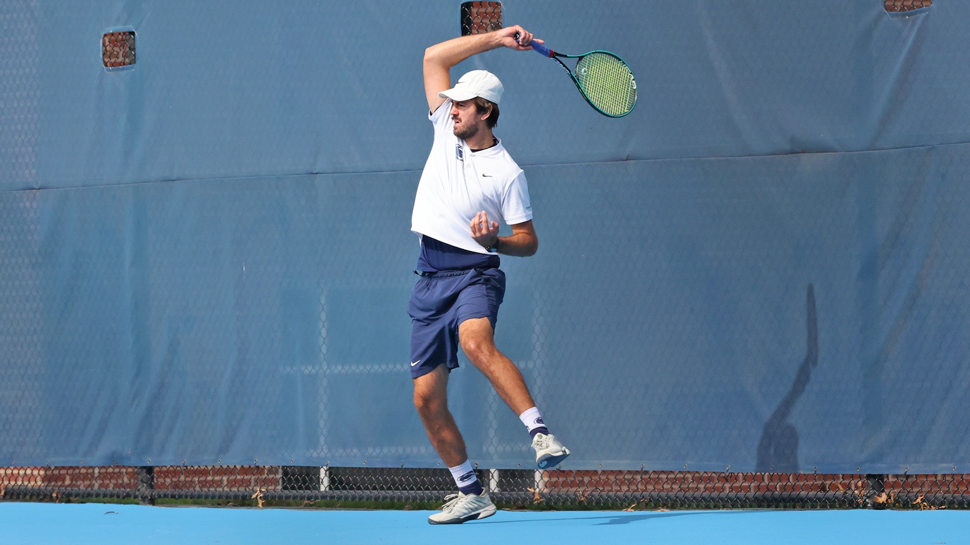 damir cuturic returns a volley during a win over stevenson in 2025