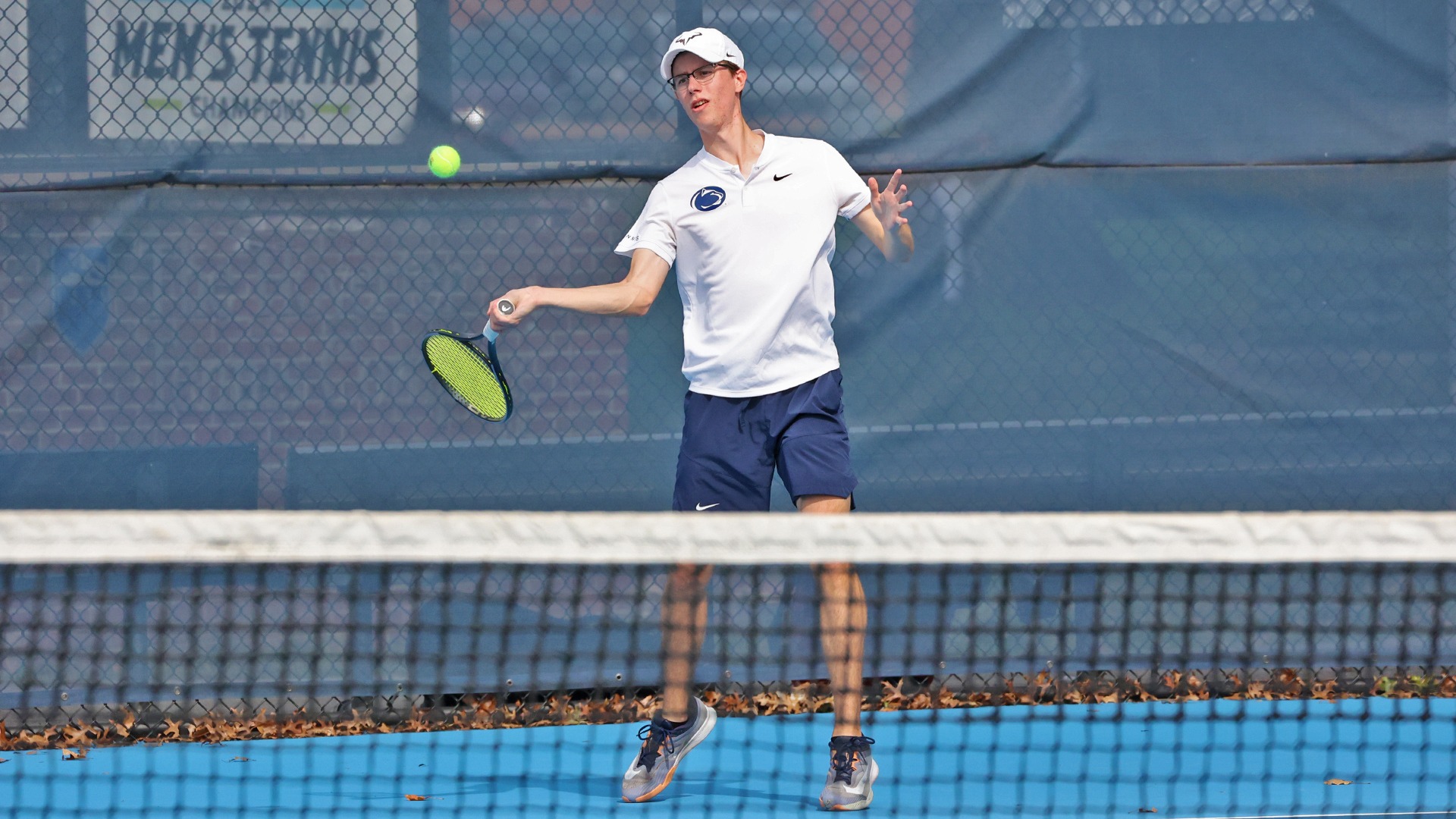 colin flack prepares to hit a ball in a match at the hoverter tennis complex
