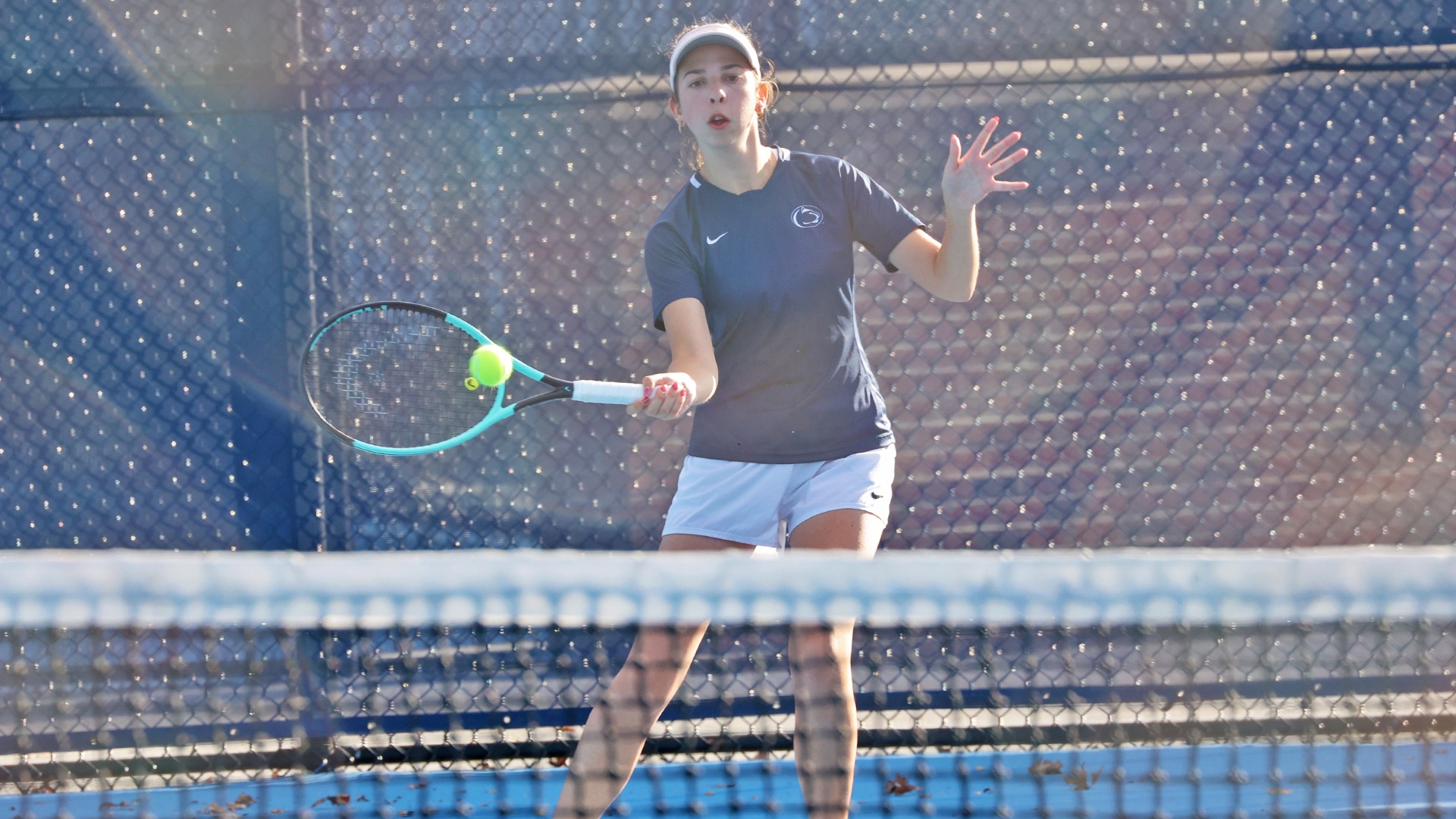Karly Anderson hits a ball in a match in the fall of 2025