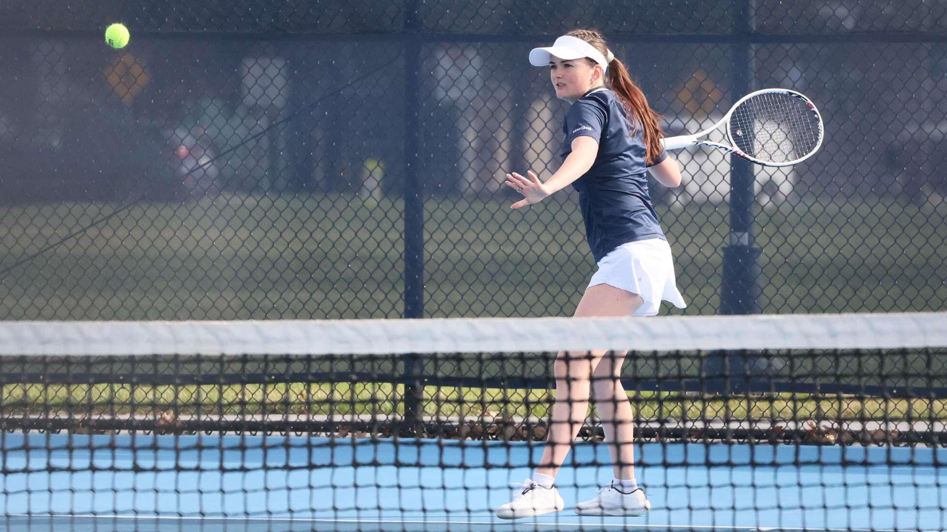 ava shepps prepares to hit a ball in a win over penn college